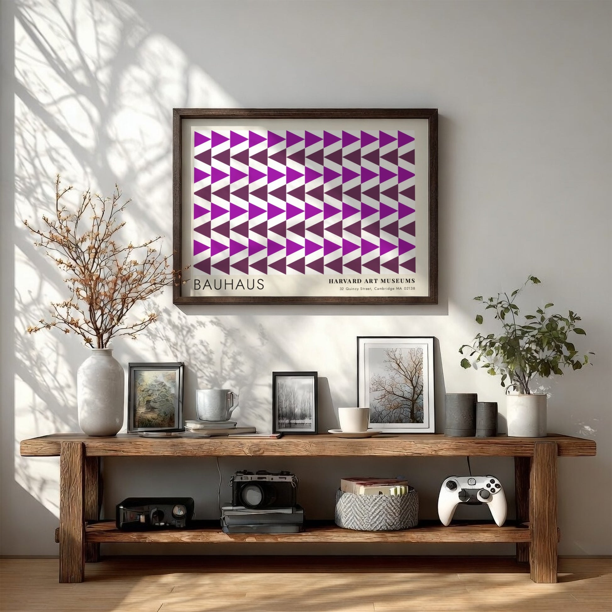 Wall art poster featuring repetitive purple geometric triangles and Bauhaus Harvard Art Museums text.