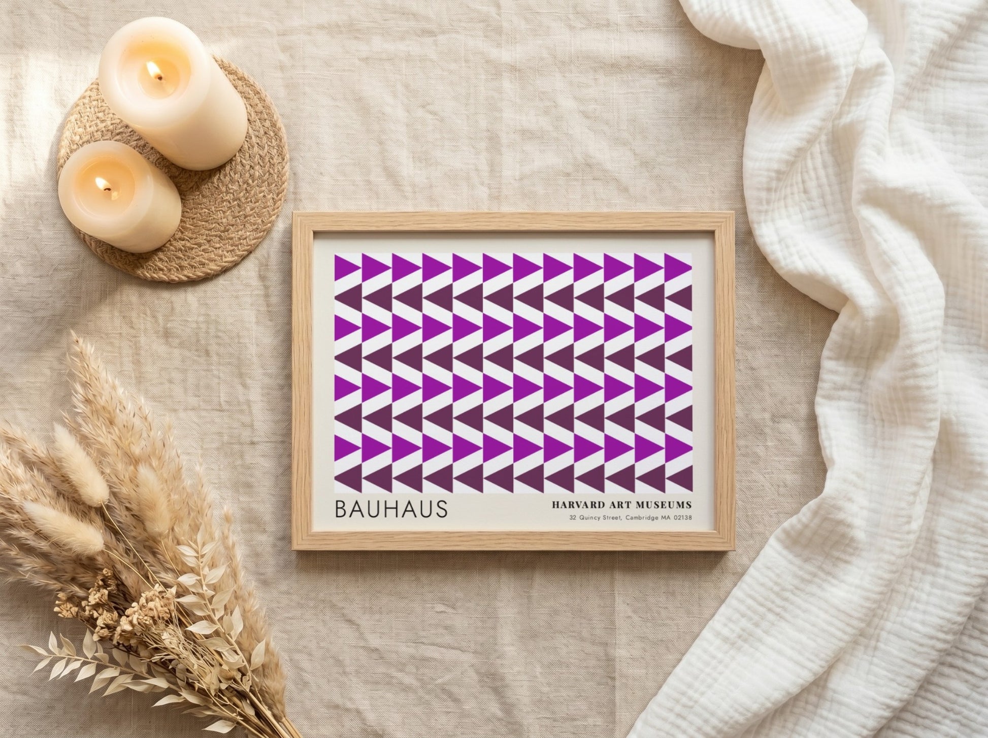 Wall art poster featuring repetitive purple geometric triangles and Bauhaus Harvard Art Museums text.