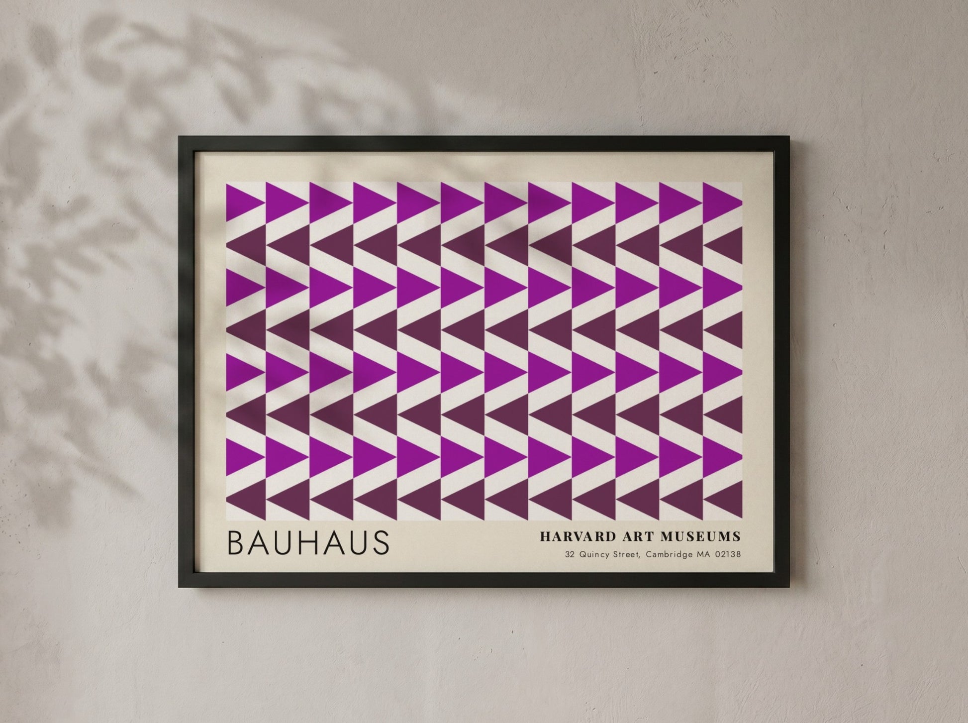 Wall art poster featuring repetitive purple geometric triangles and Bauhaus Harvard Art Museums text.
