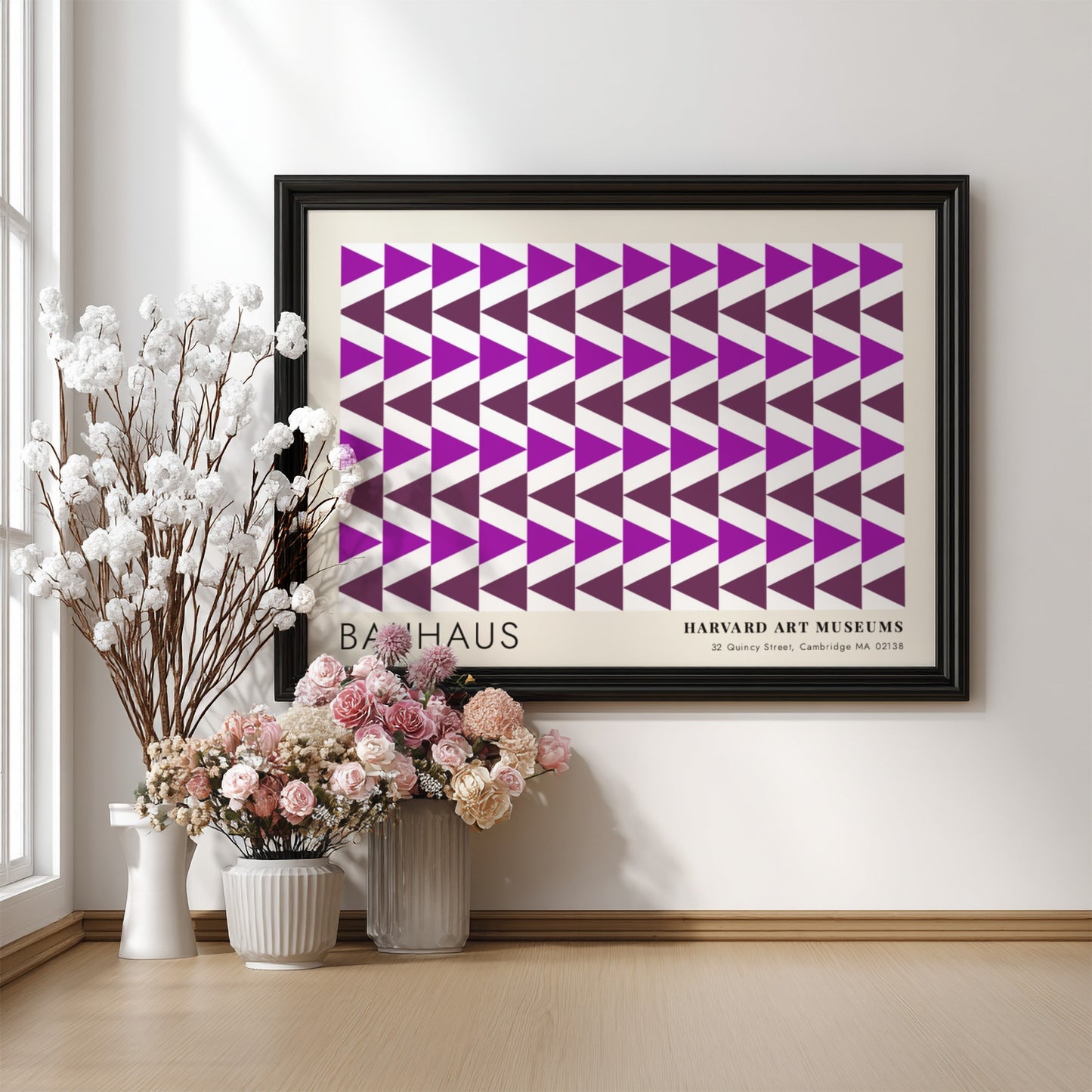 Wall art poster featuring repetitive purple geometric triangles and Bauhaus Harvard Art Museums text.