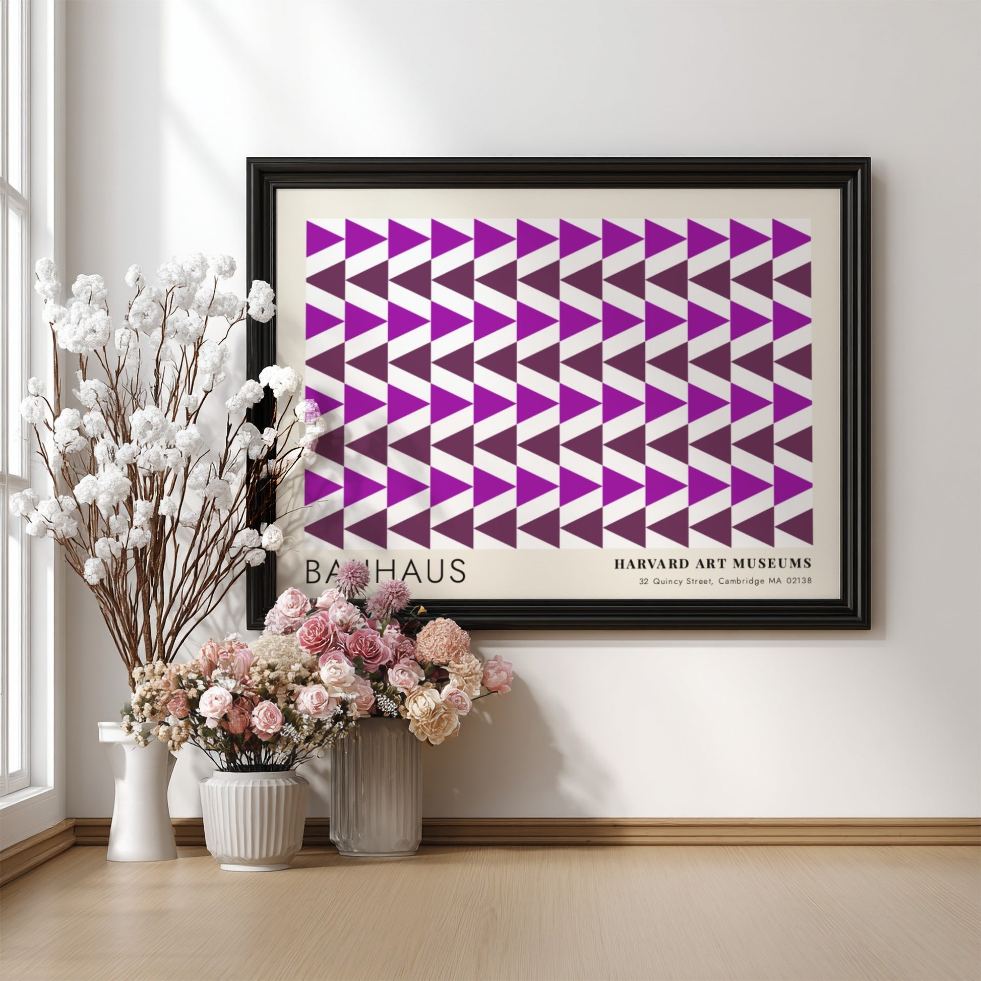 Wall art poster featuring repetitive purple geometric triangles and Bauhaus Harvard Art Museums text.