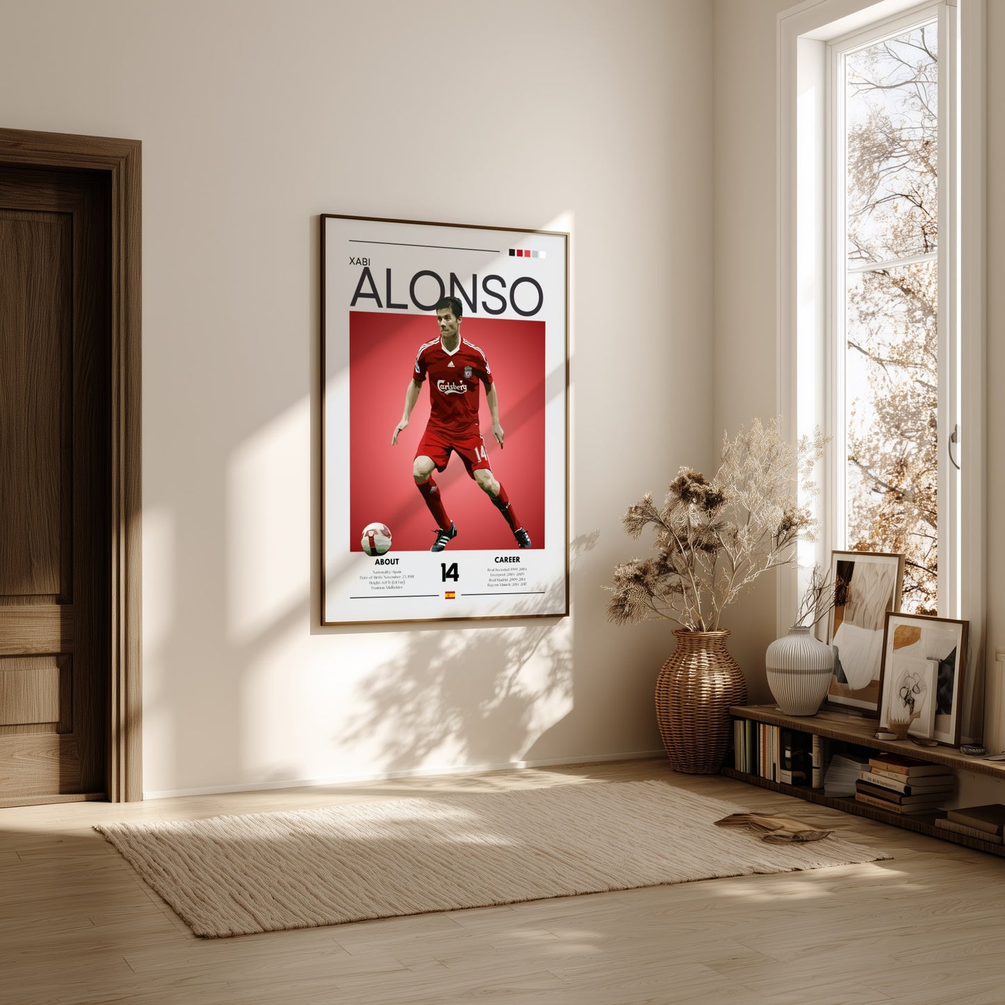 Framed poster of a soccer player on a wall in a bright room with natural light.