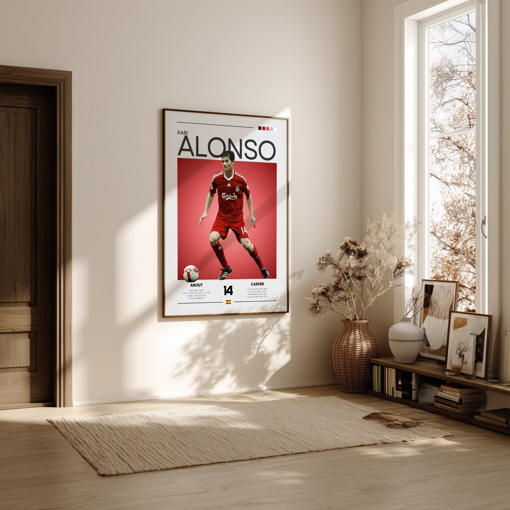 Framed poster of a soccer player on a wall in a bright room with natural light.
