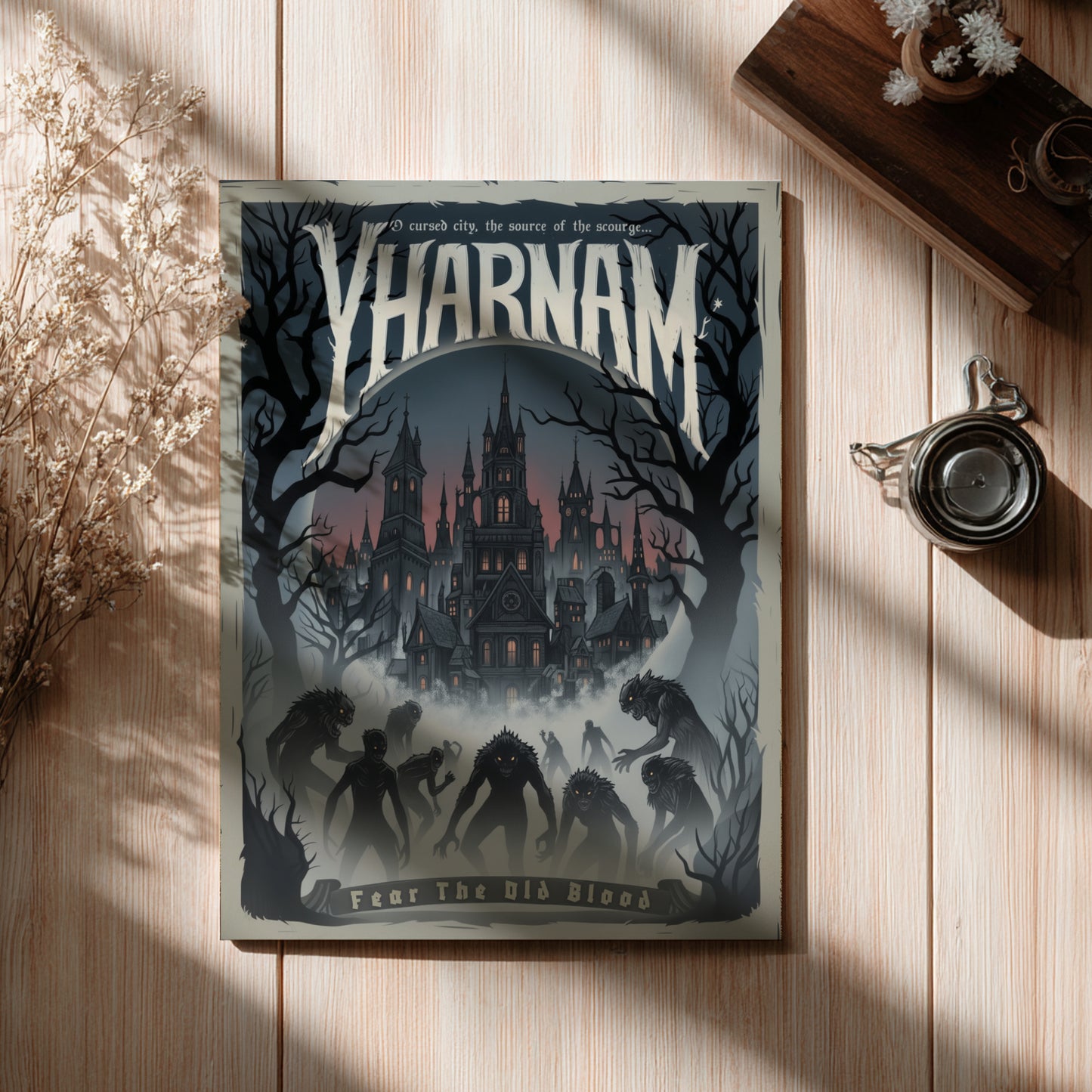 Poster of 'Yharnam' with a dark cover featuring a castle and silhouettes on a wooden surface.