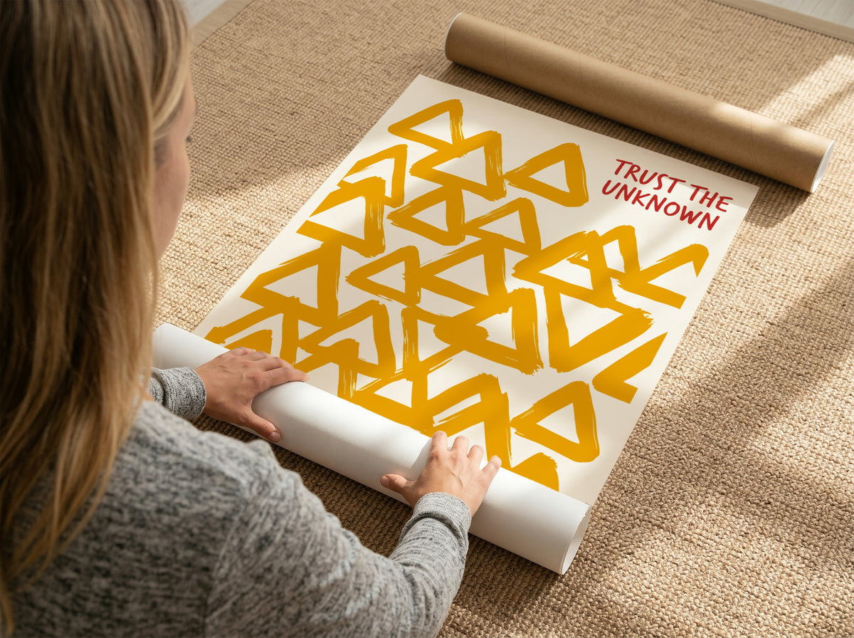 Motivational poster featuring hand-painted yellow triangles and the text Trust The Unknown above.