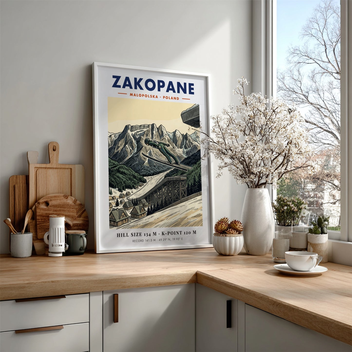 Poster showing a ski jumper in mid-air above the Zakopane mountain range landscape.