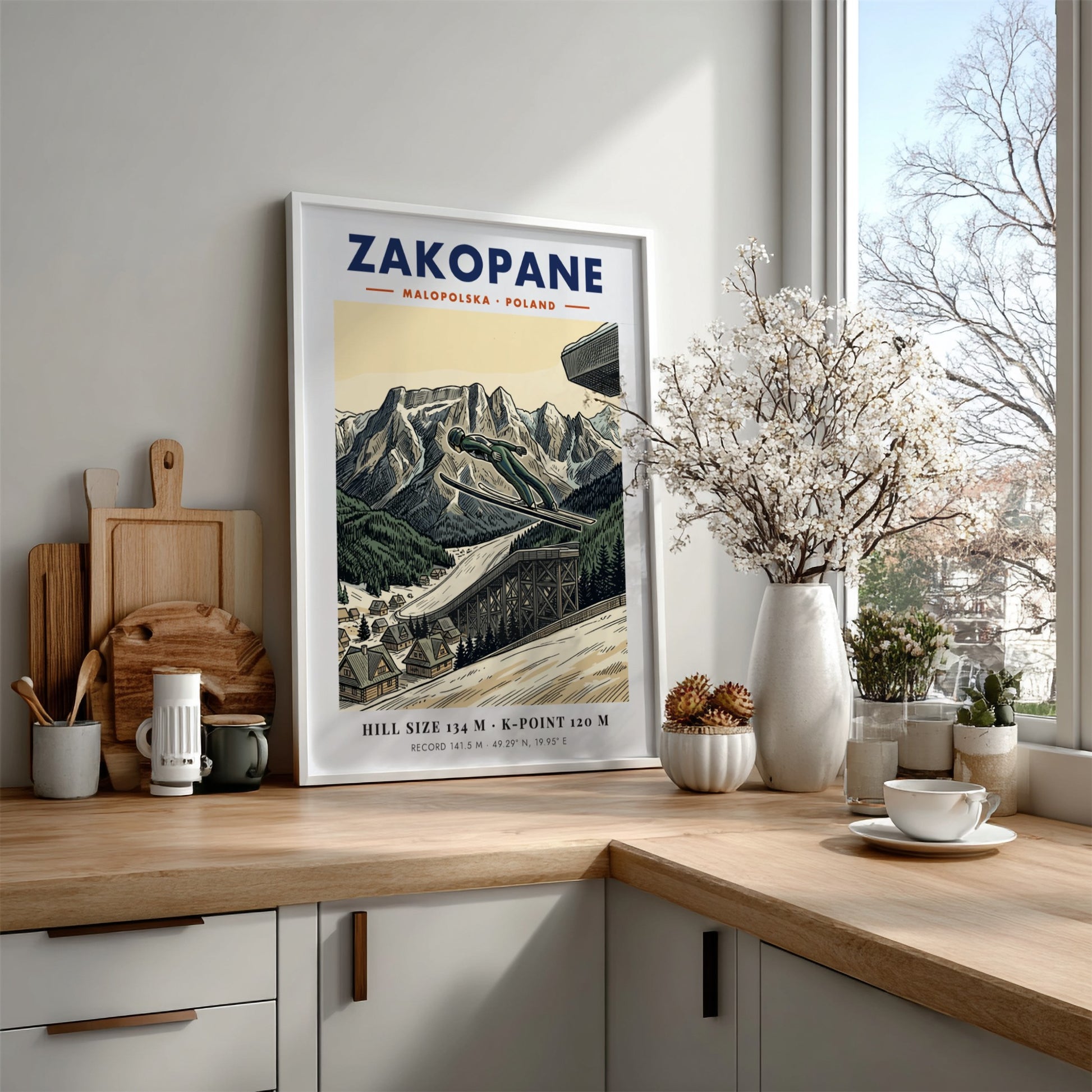 Poster showing a ski jumper in mid-air above the Zakopane mountain range landscape.