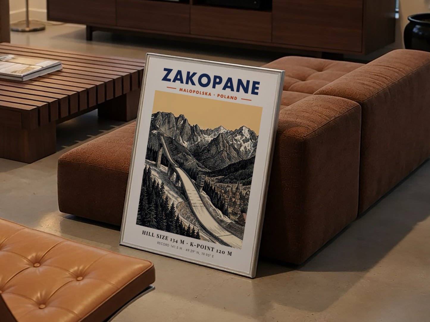 Poster of the Zakopane ski jump with jagged mountain peaks and a small village.