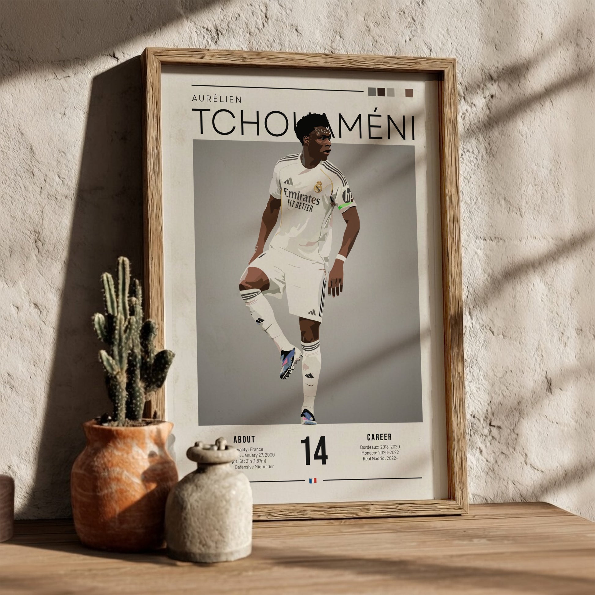 Real Madrid player poster featuring Aurélien Tchouaméni in a dynamic pose with a sleek color palette