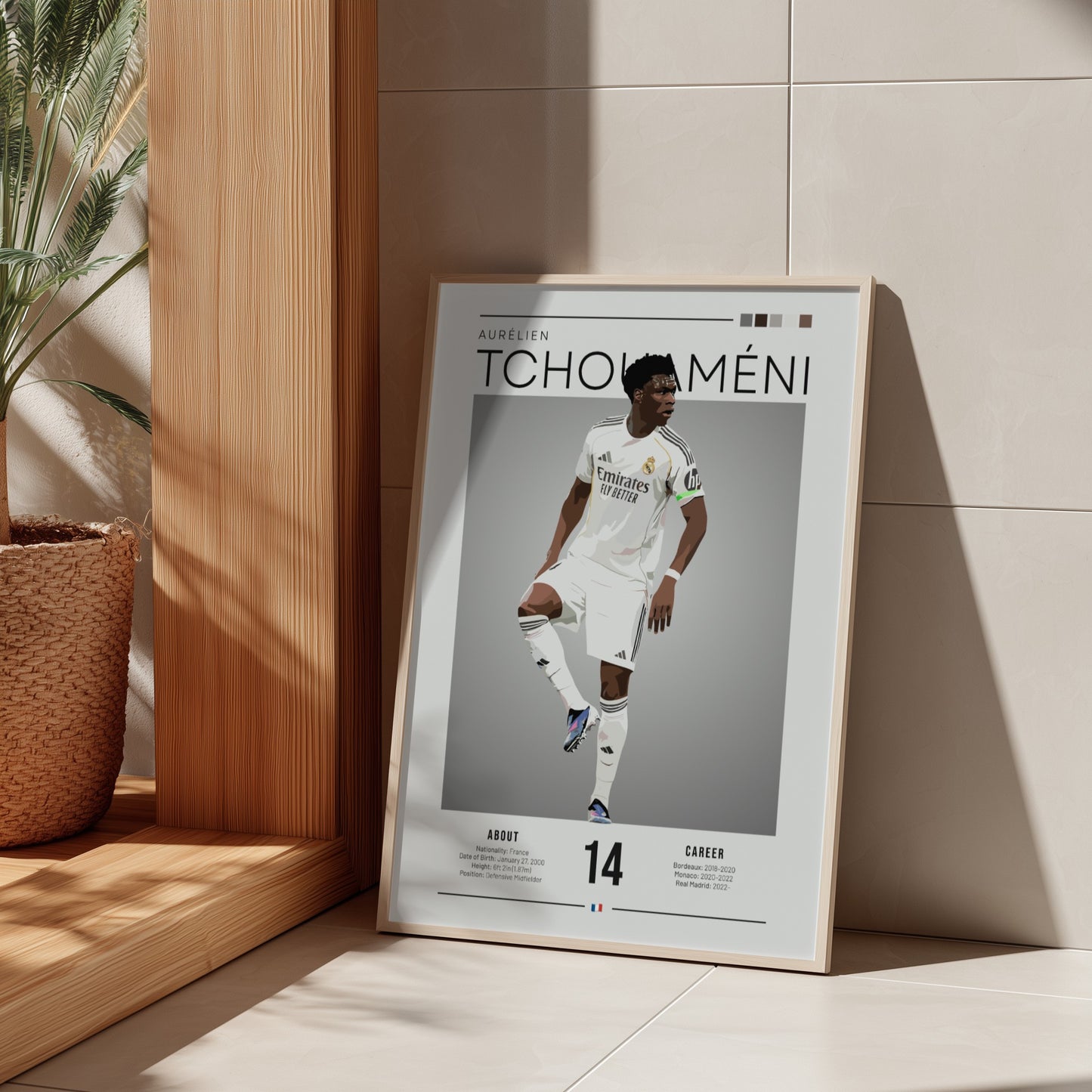 Real Madrid player poster featuring Aurélien Tchouaméni in a dynamic pose with a sleek color palette