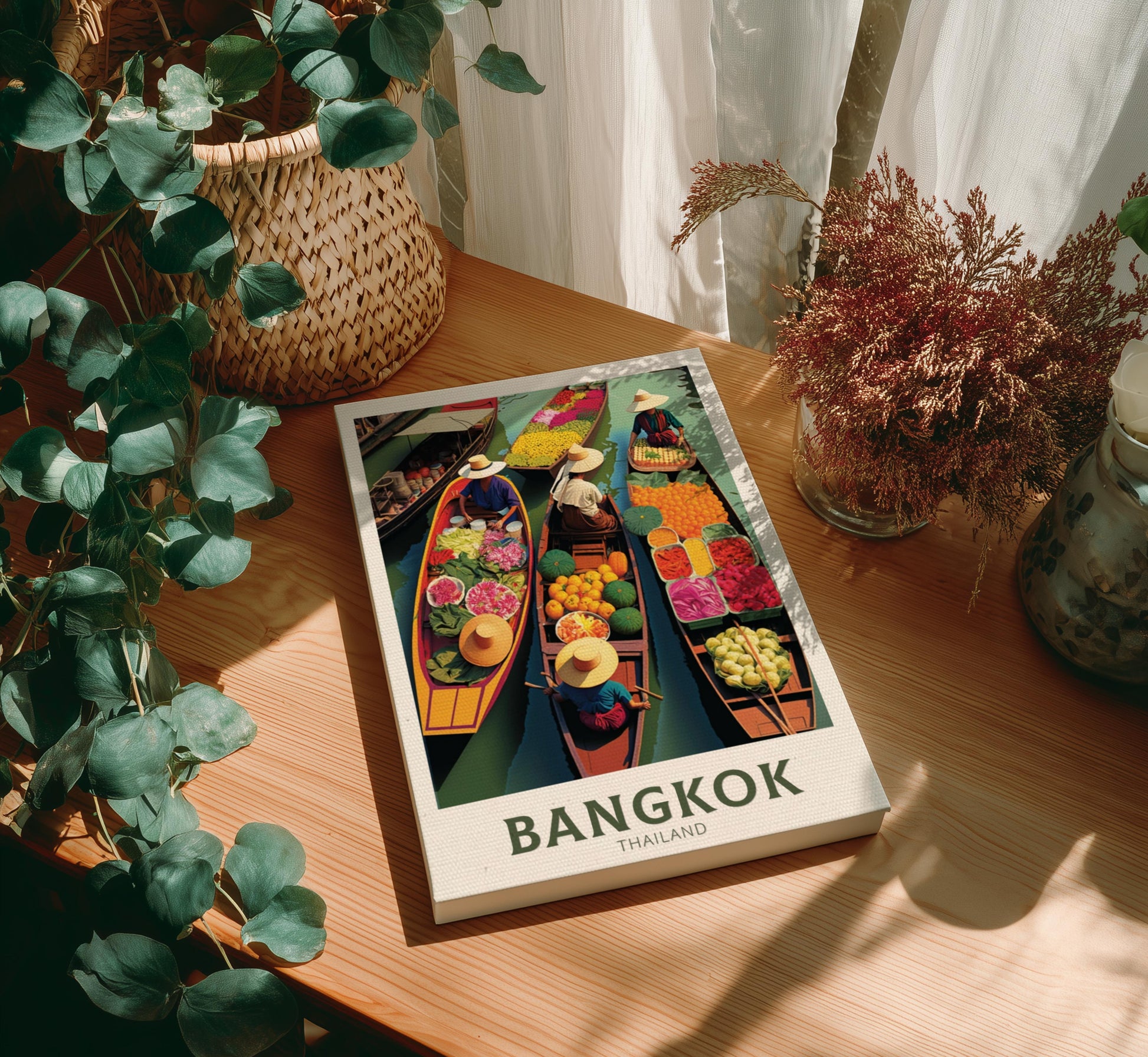 Canvas 'Bangkok' on a wooden table with plants around