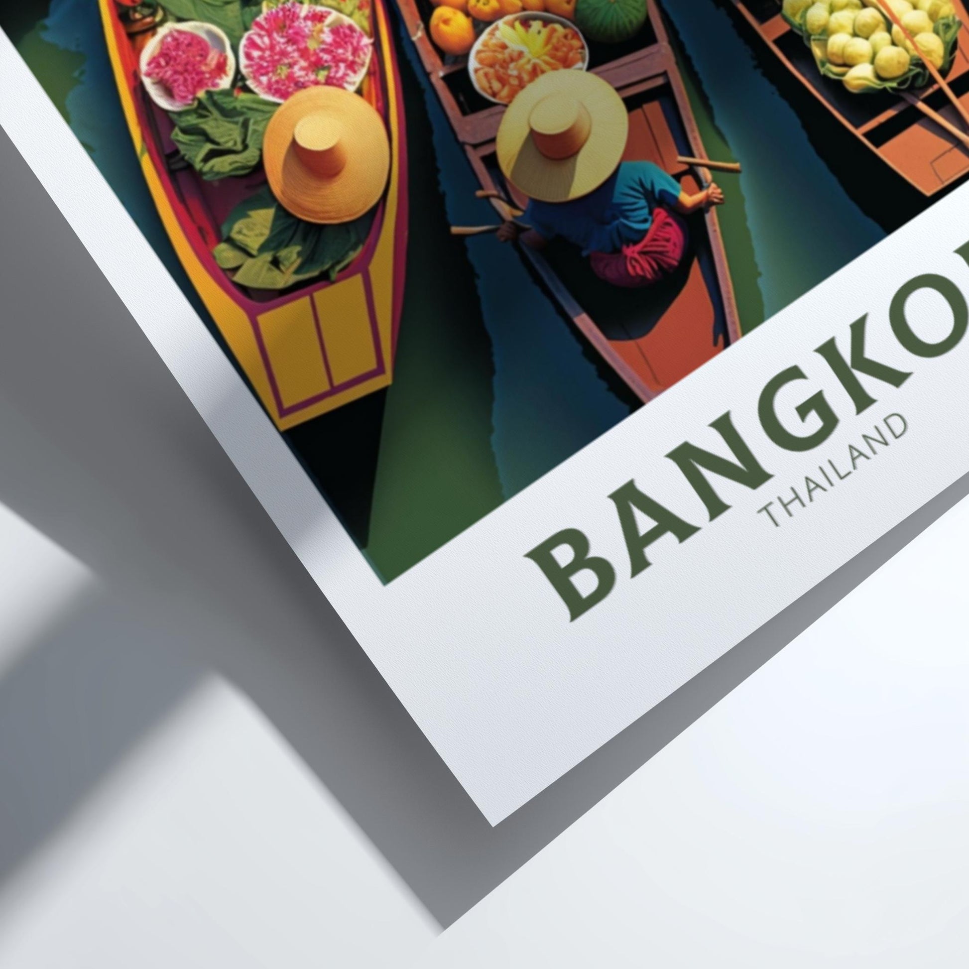 Poster of Bangkok with a boat scene and 'Bangkok Thailand' text.