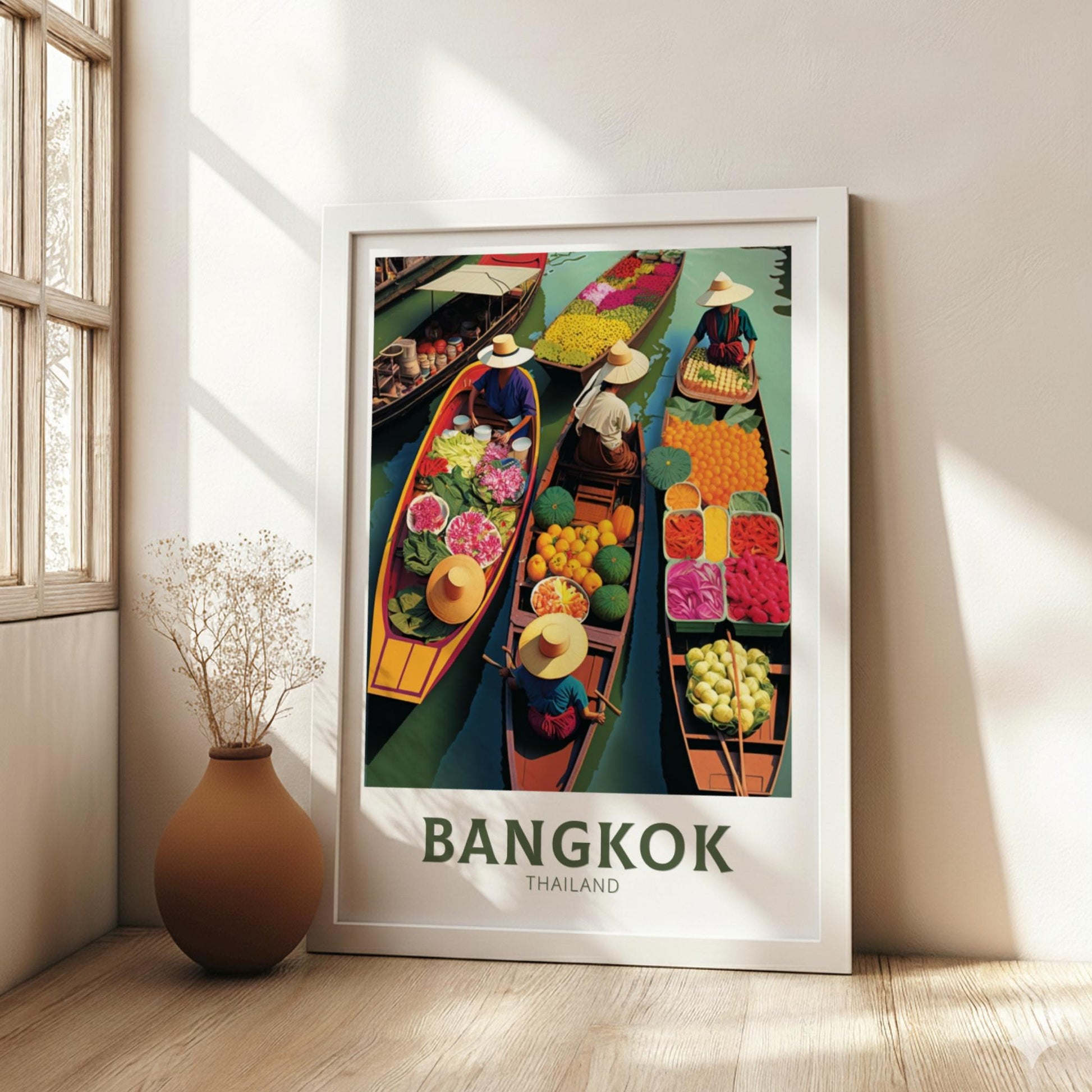 Framed poster of Bangkok, Thailand with colorful boats and market scene on a wall.