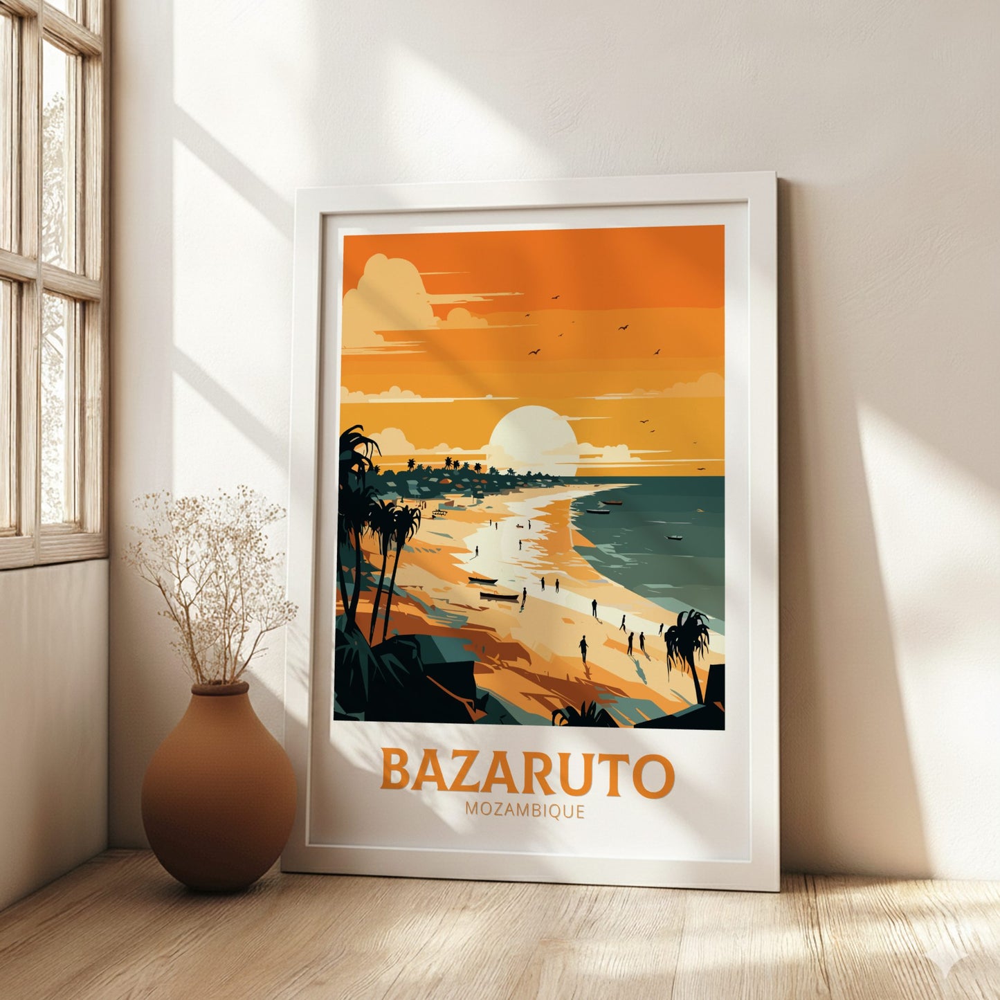 Framed artwork of a beach scene with 'Bazaruto Mozambique' text in a room with a vase and window.
