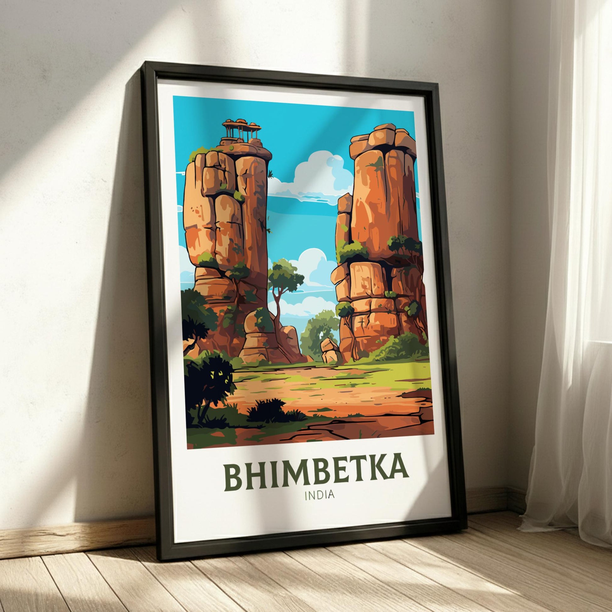 Framed poster of Bhimbetka, India with rock formations and trees on a white wall.