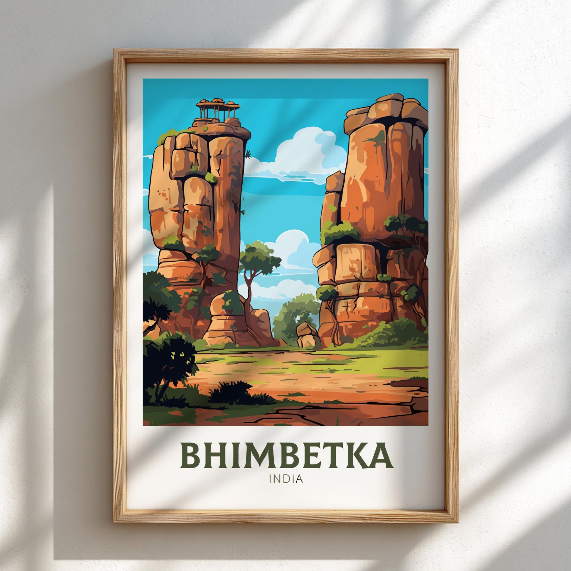 Travel artwork print of Bhimbetka rock shelters in India, featuring prehistoric rock paintings and rugged caves, with a vibrant blue sky and green landscape.