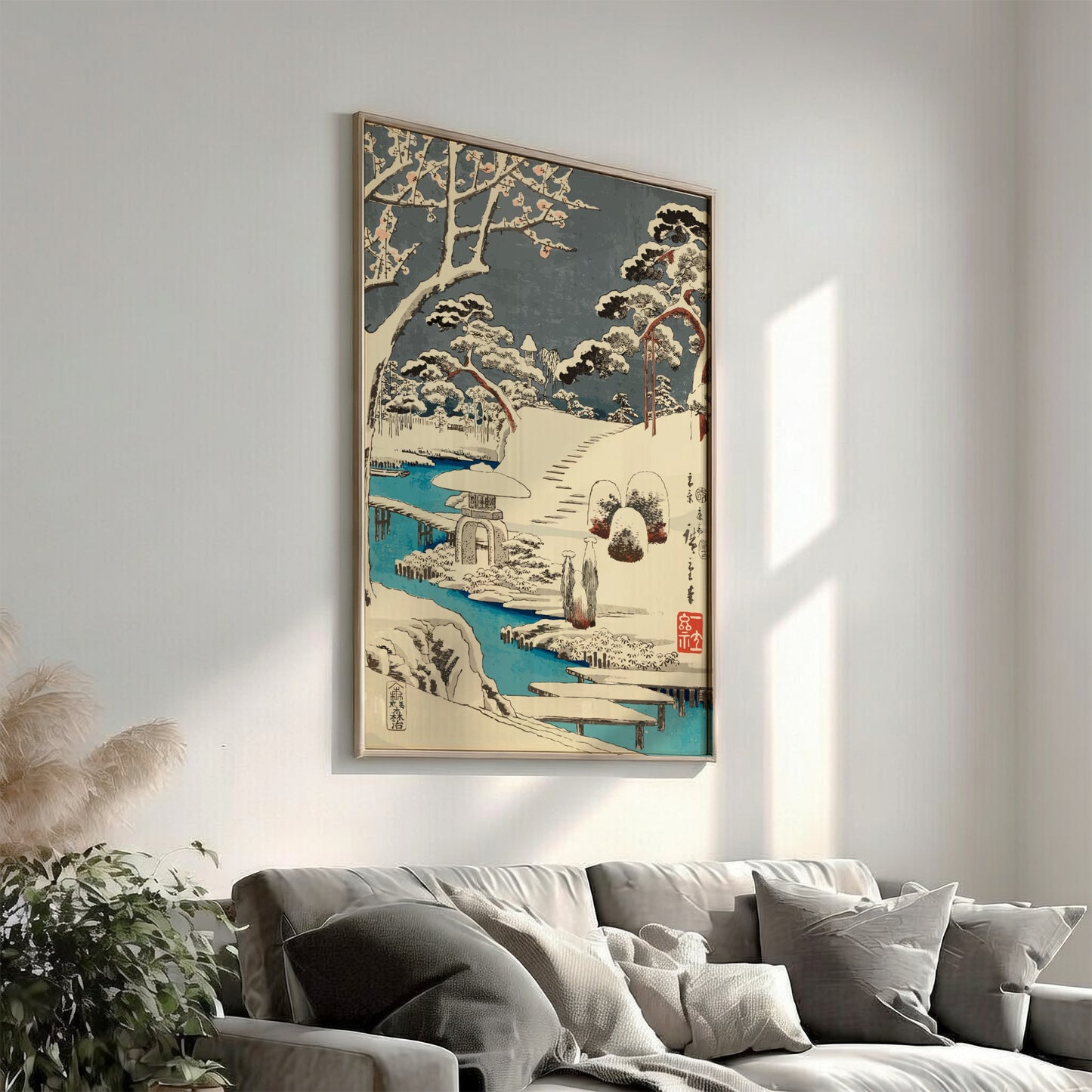 Japanese art poster of plum blossoms in snow, featuring a stone lantern and a blue river in Ukiyo-e style.