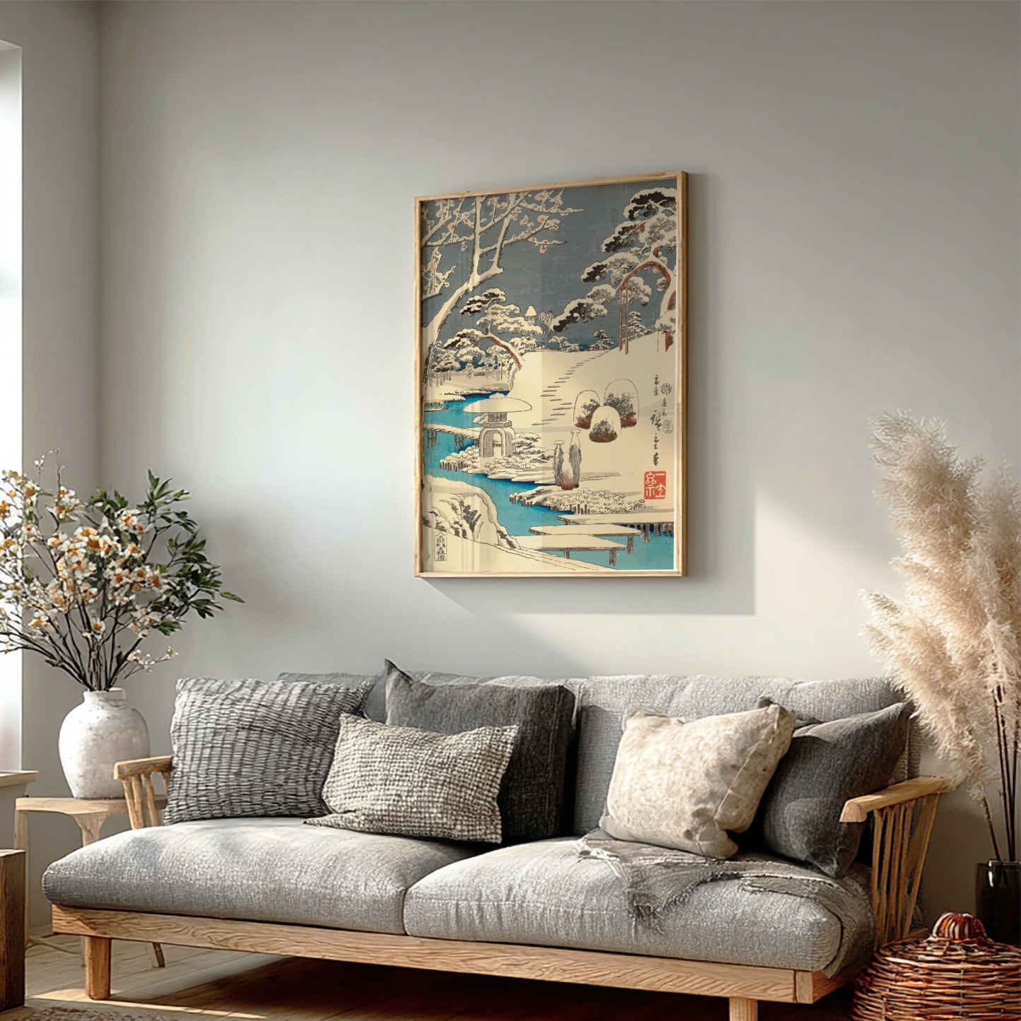 Japanese art poster of plum blossoms in snow, featuring a stone lantern and a blue river in Ukiyo-e style.