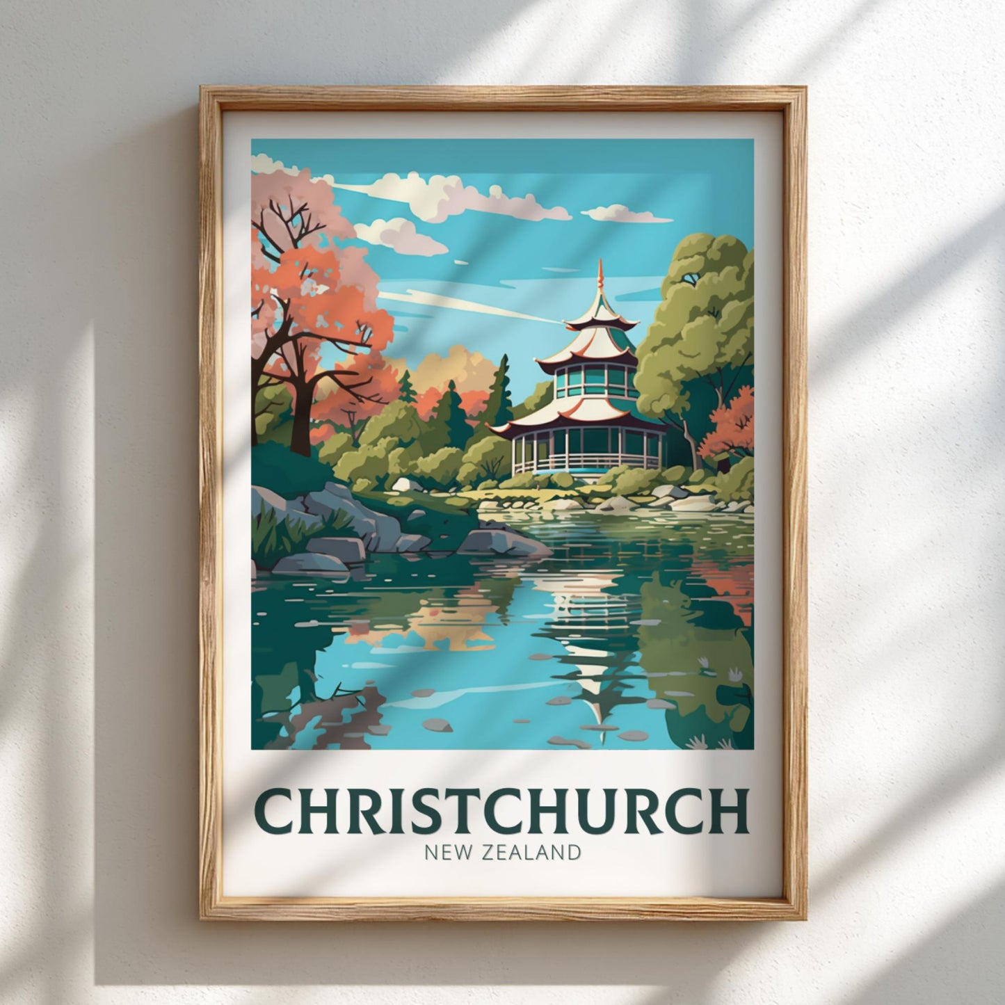 Framed artwork of Christchurch, New Zealand with a scenic landscape.