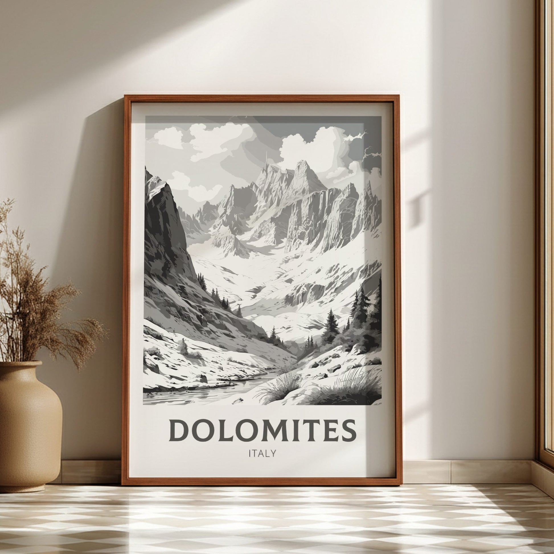 Framed print of the Dolomites mountains in Italy on a wall.