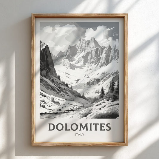 Framed print of a mountain landscape with 'Dolomites, Italy' text on a white wall.