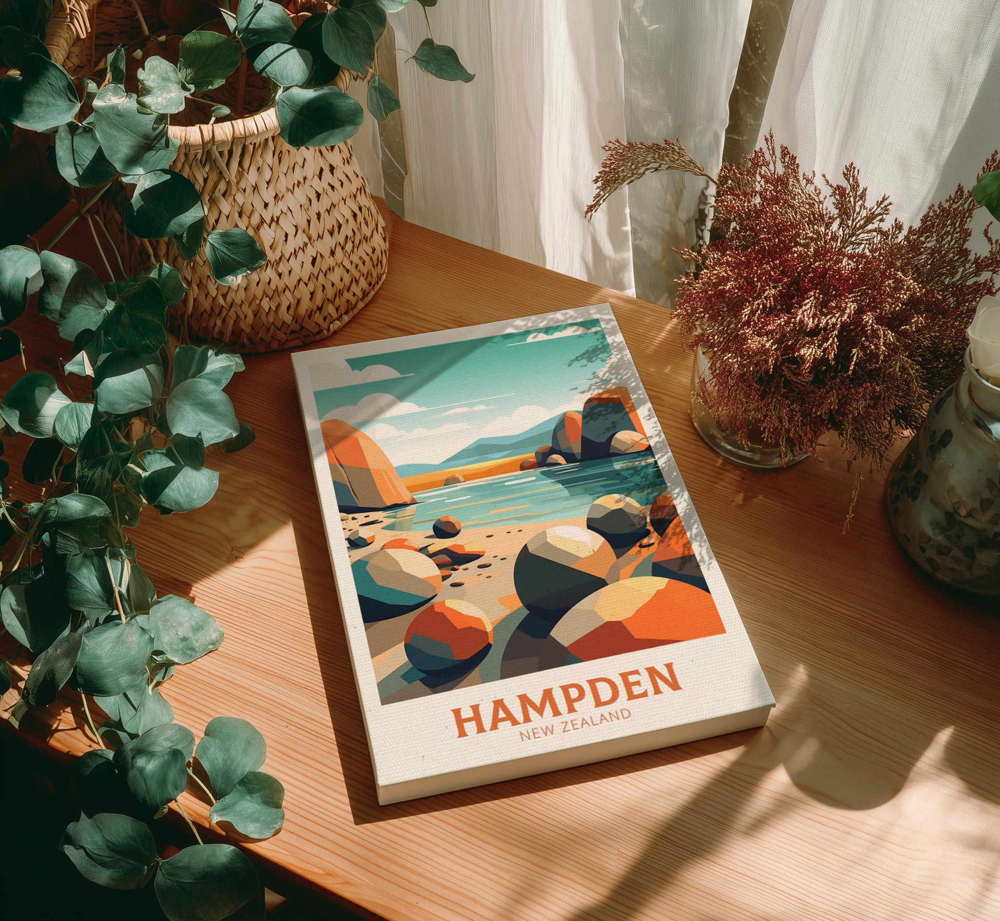 Canvas of 'Hampden New Zealand' on a wooden table with plants