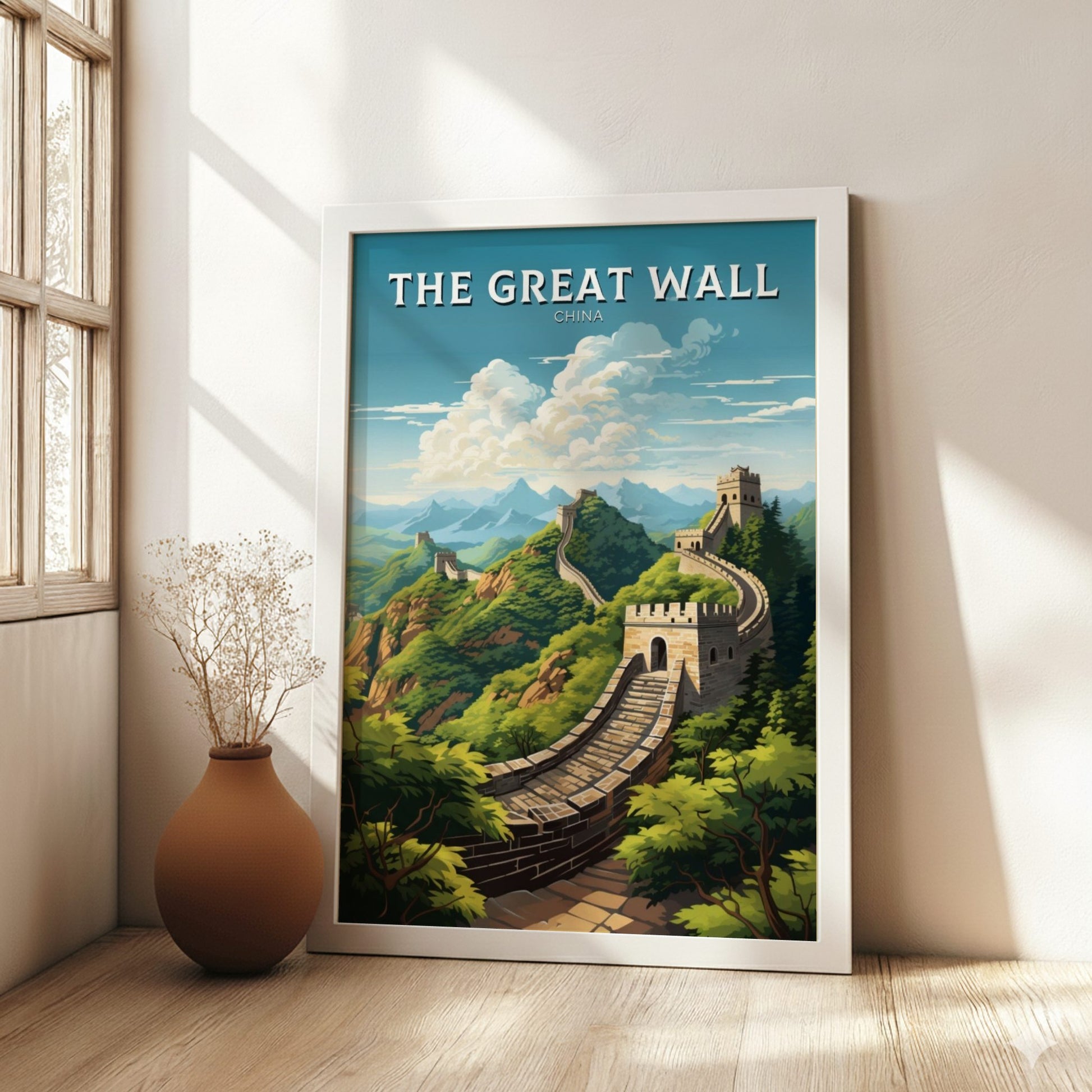 Framed poster of The Great Wall of China in a room with a vase and window.