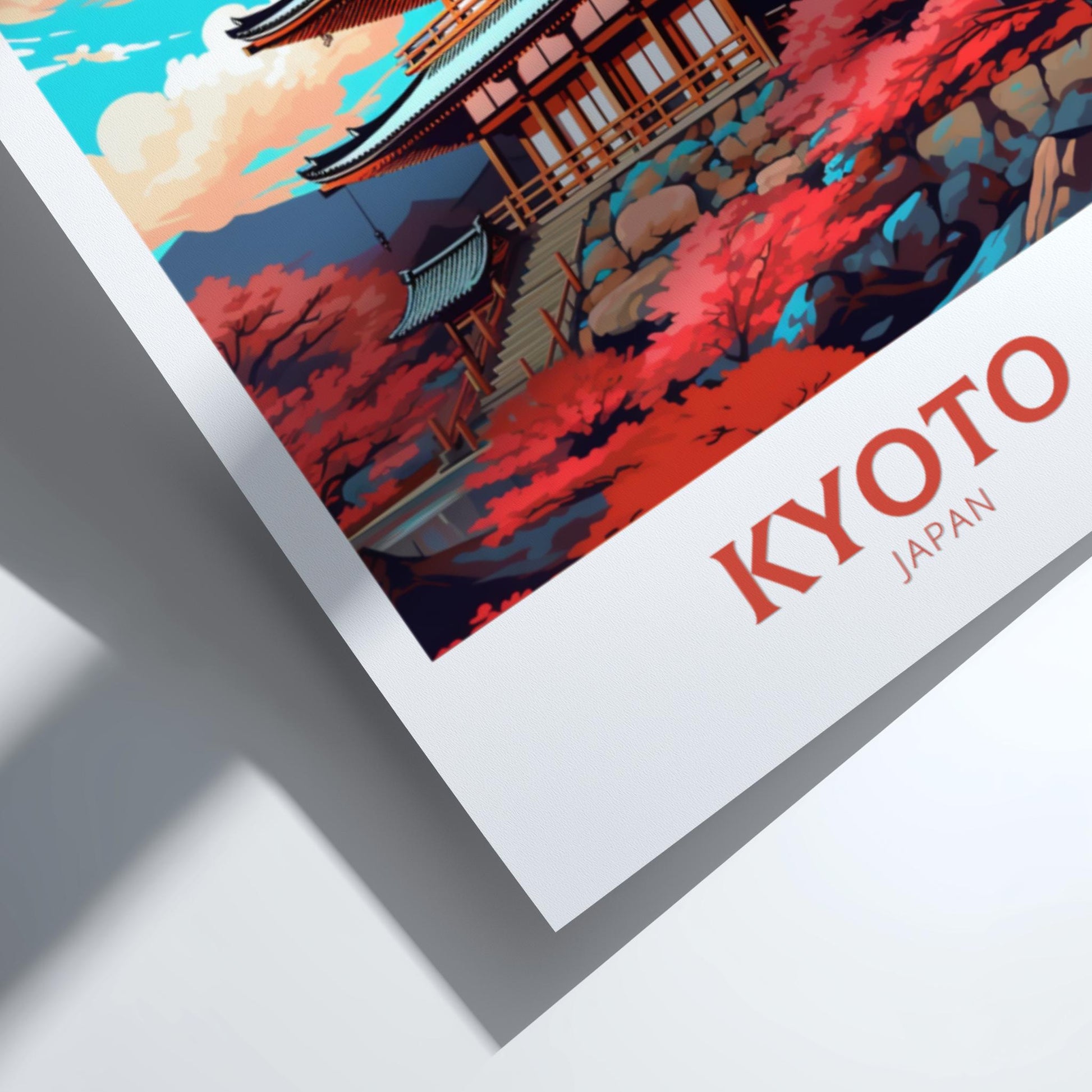 Framed artwork of a traditional Japanese building with cherry blossoms and 'Kyoto Japan' text.