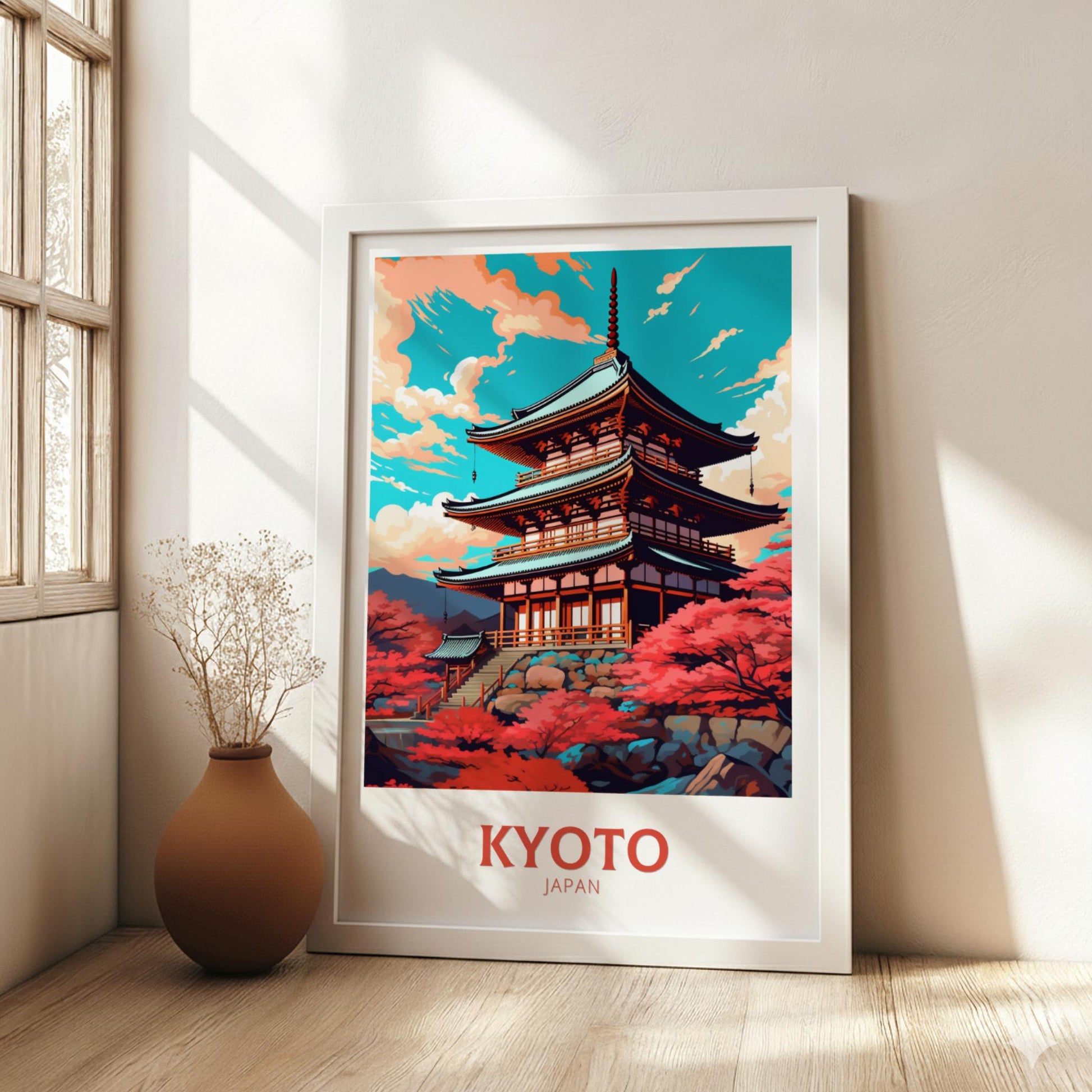 Framed poster of a temple in Kyoto, Japan, on a wall in a bright room.