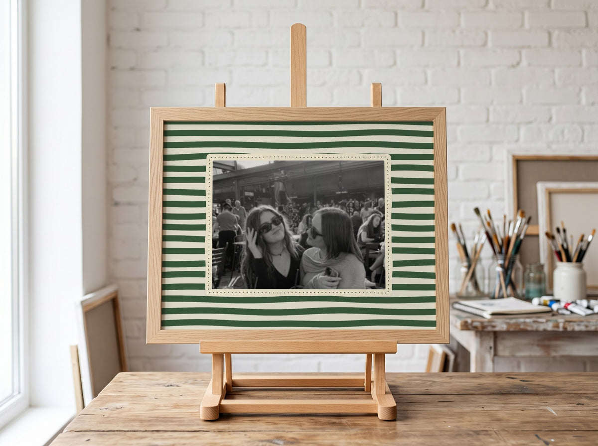 Personalised Striped Landscape Photo Print in an oak frame on an easel in an art studio