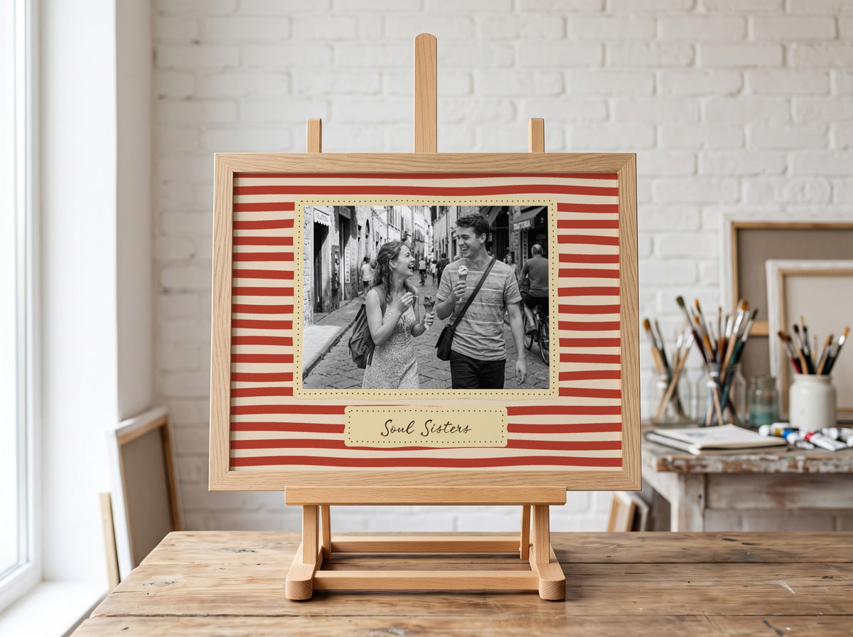 Personalised Stripes Soul Sisters Landscape Print in an oak frame on an easel in an art studio