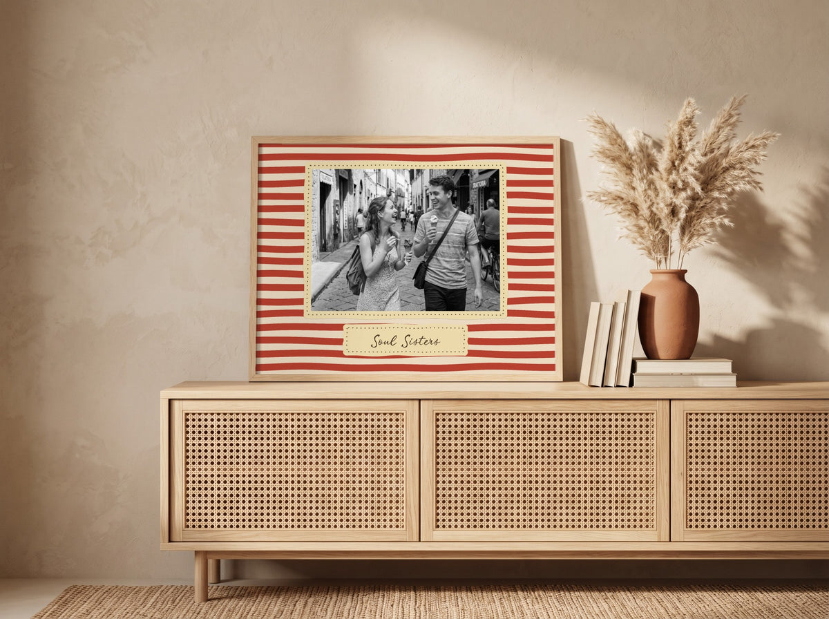 Personalised Stripes Soul Sisters Landscape Print in an oak frame leaning against a wall in a boho room