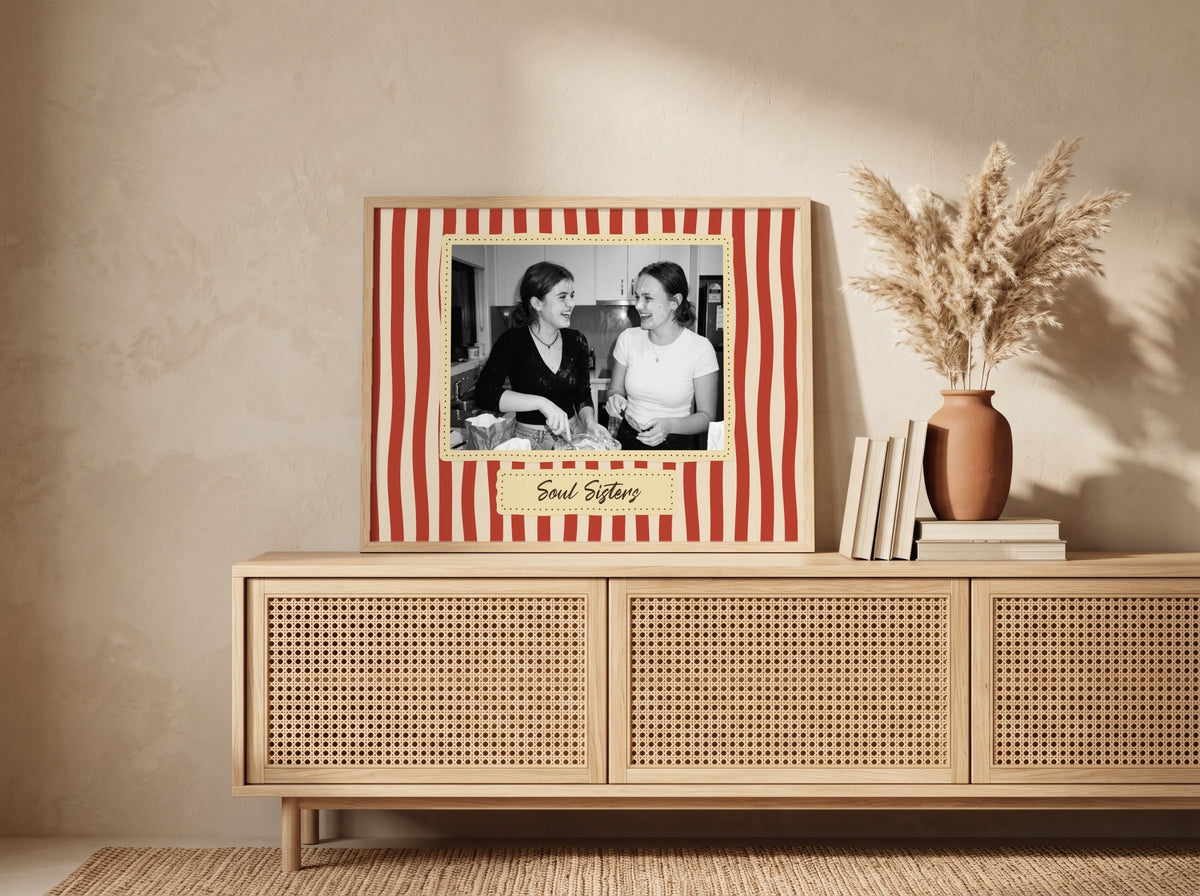 Personalised Soul Sisters Landscape Photo Poster in an oak frame leaning against a wall in a boho room