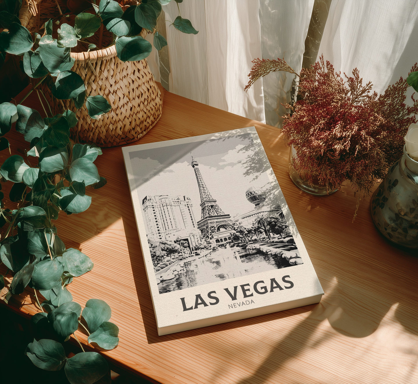 Canvas 'Las Vegas, Nevada' on a wooden table with plants