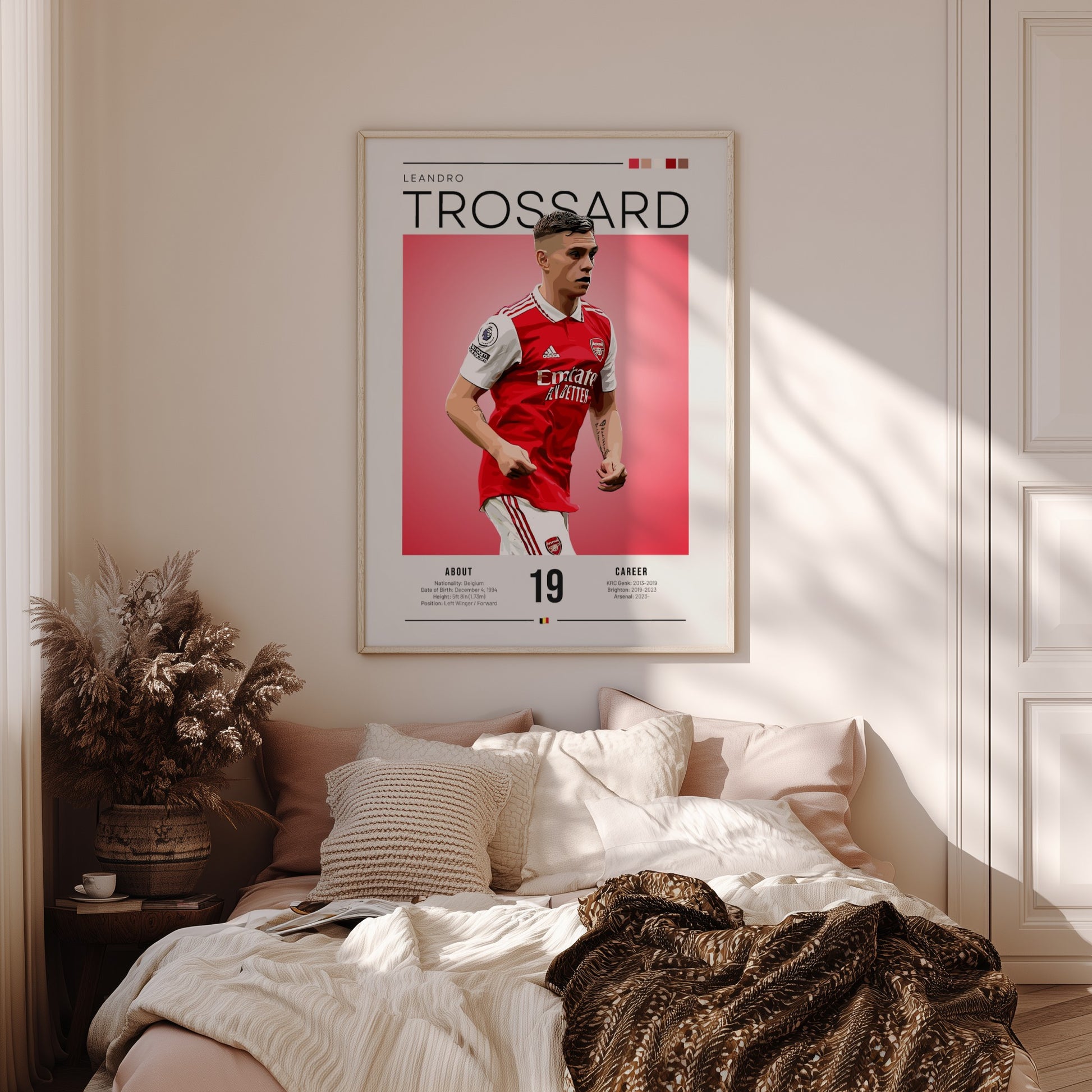 Leandro Trossard poster featuring vibrant colors and dynamic football action, perfect for wall decor.