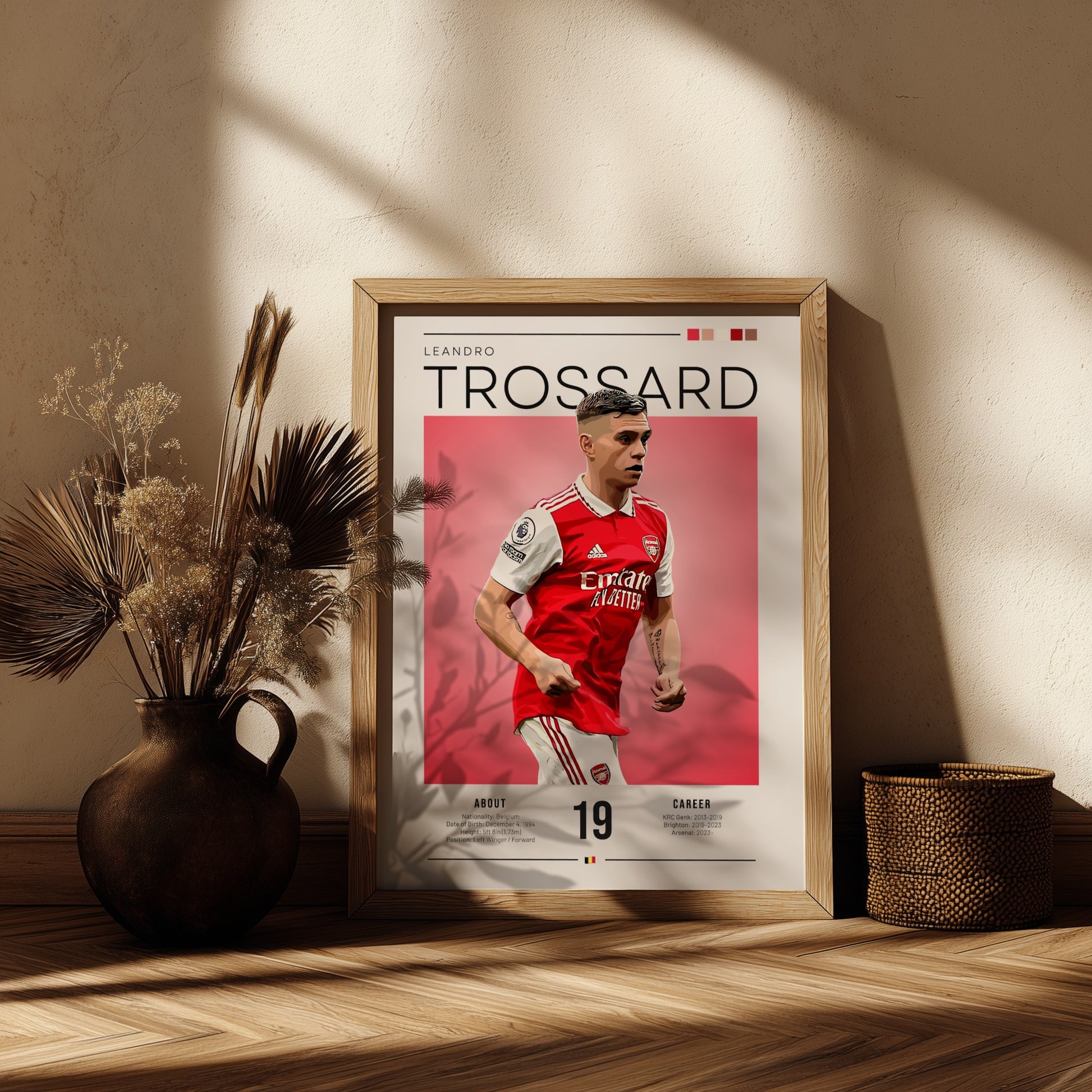 Leandro Trossard poster featuring vibrant colors and dynamic football action, perfect for wall decor.