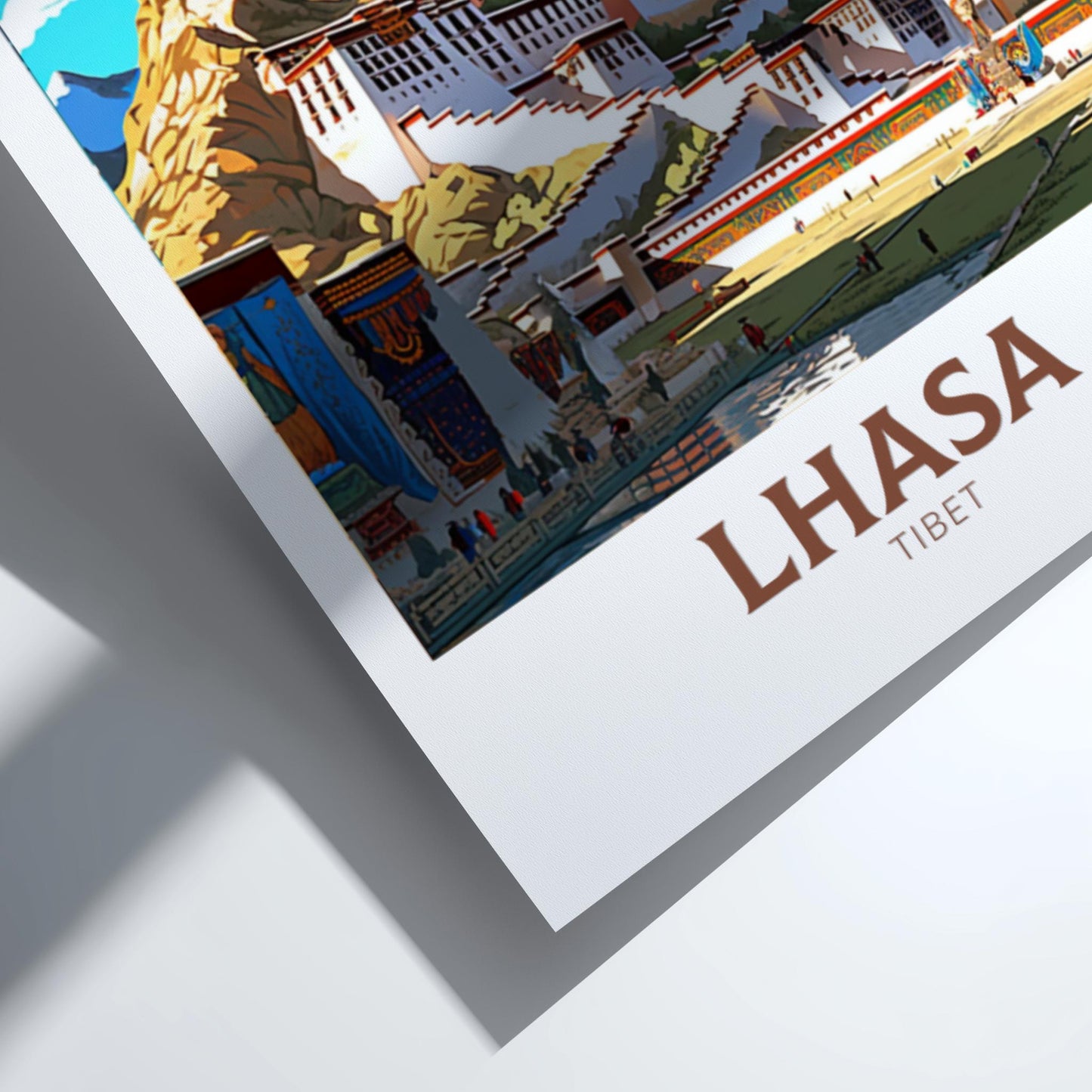 Framed artwork of a scenic view with 'Lhasa Tibet' text on a white background