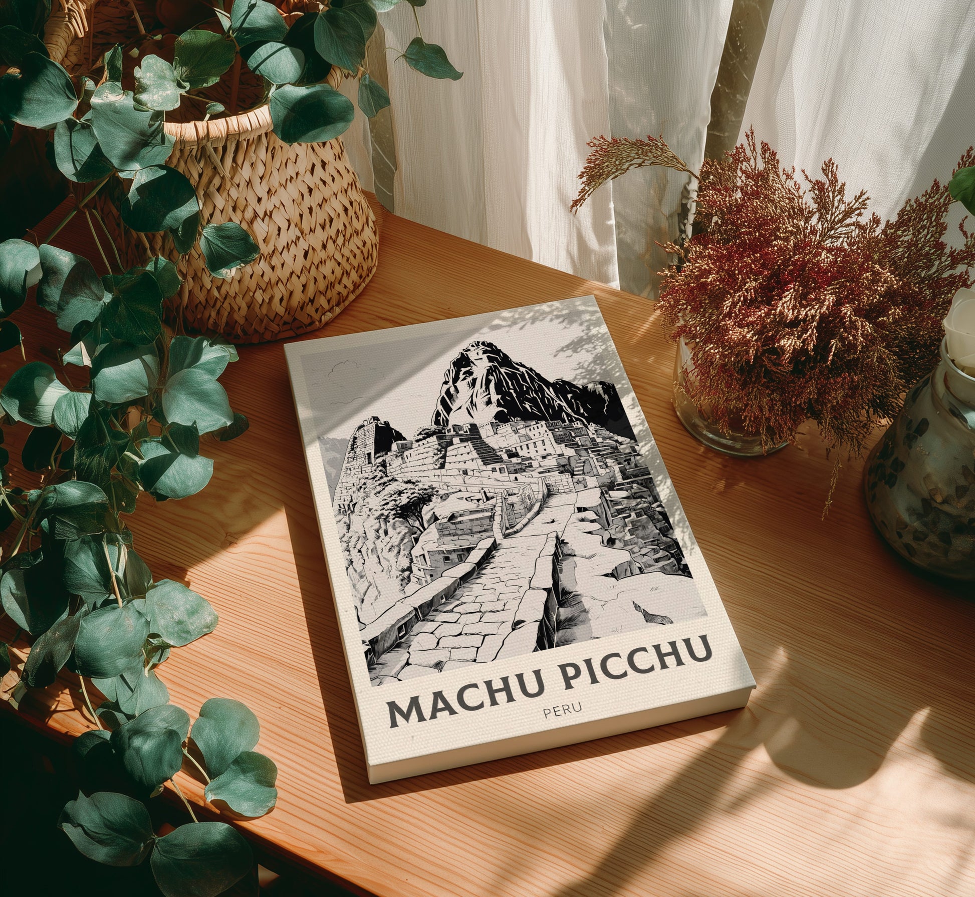 Canvas 'Machu Picchu Peru' on a wooden table with plants around