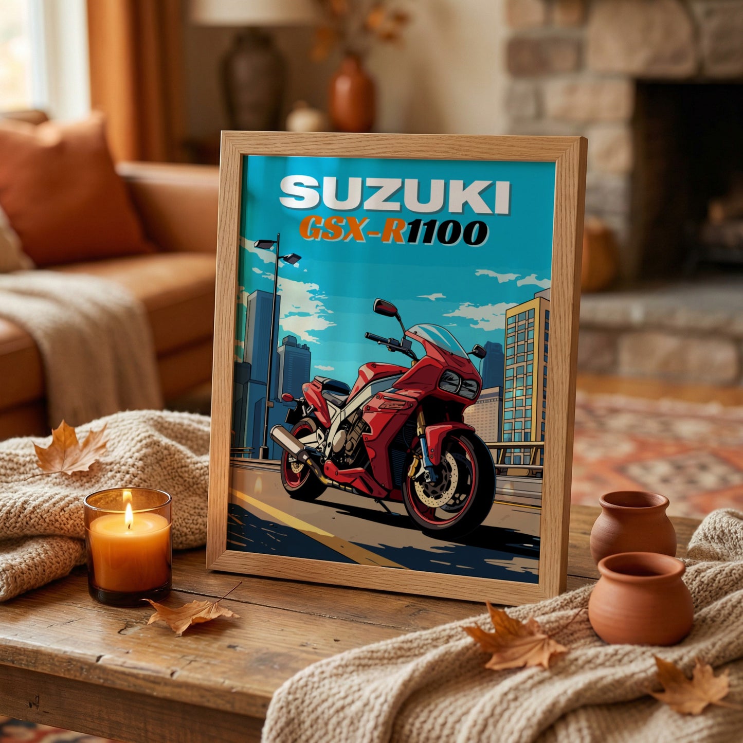 Framed poster of a red Suzuki GSX-R1100 motorcycle on a wooden table with a cozy living room background.