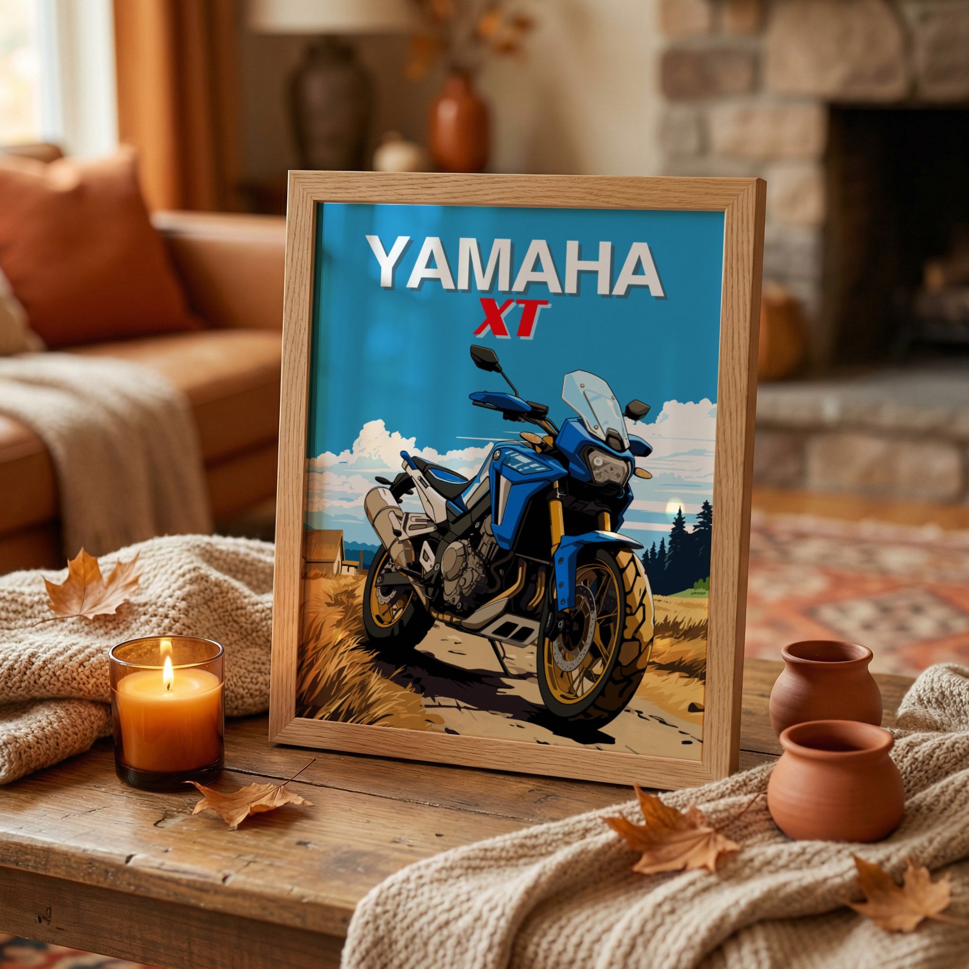 Framed Yamaha XT motorcycle poster on a wooden table with a cozy living room background.