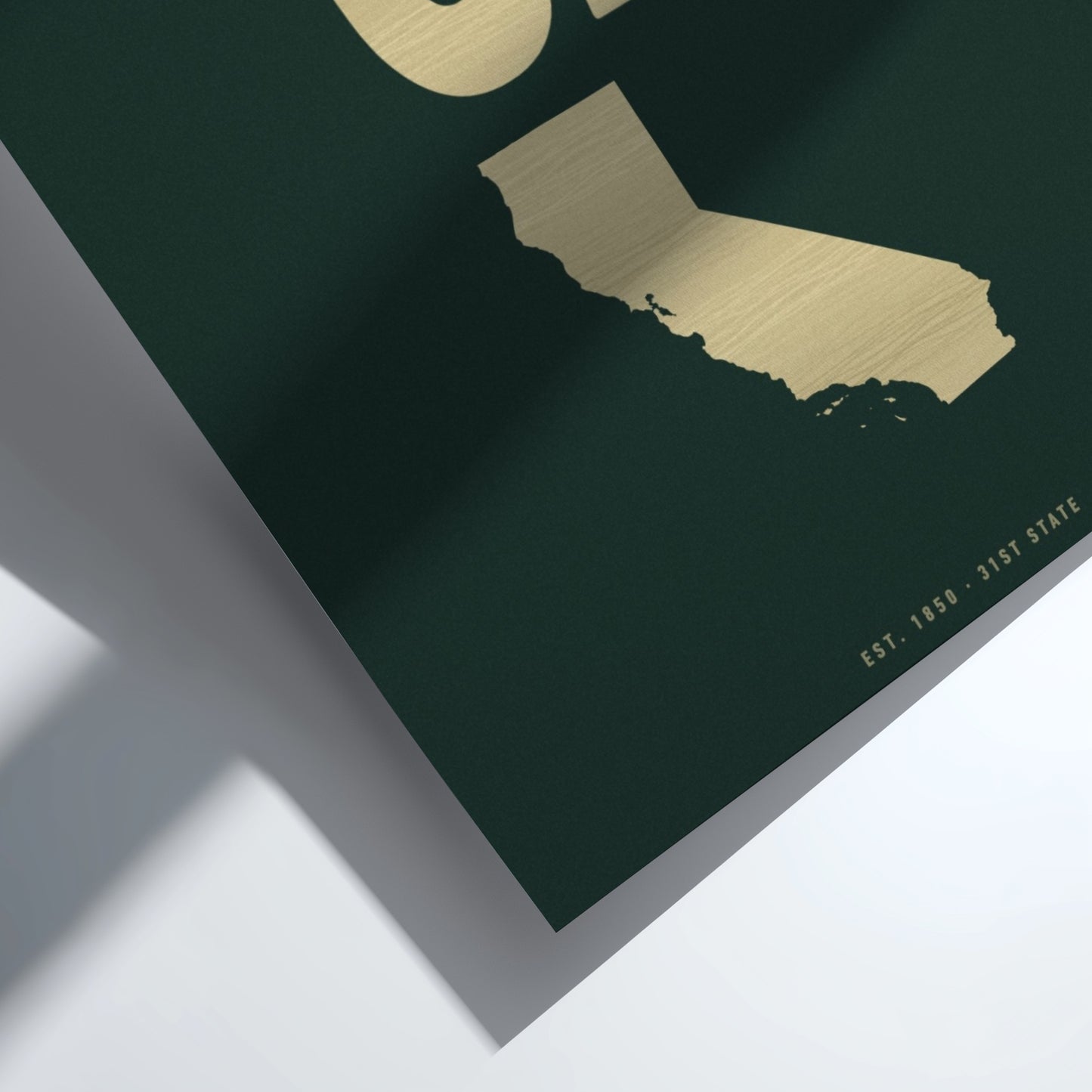 Gold map of California on a dark green background