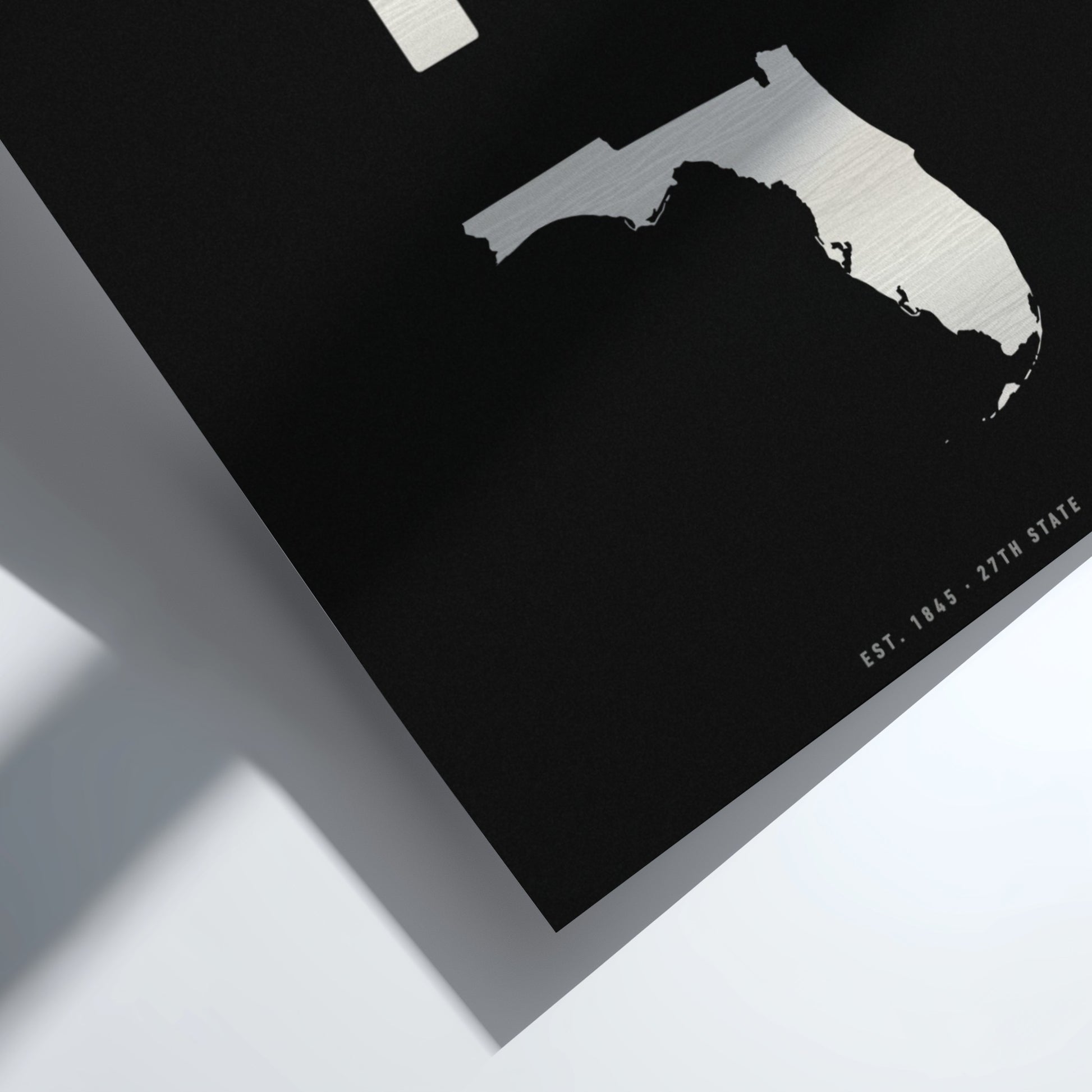 Map of Florida on a black background with white outline
