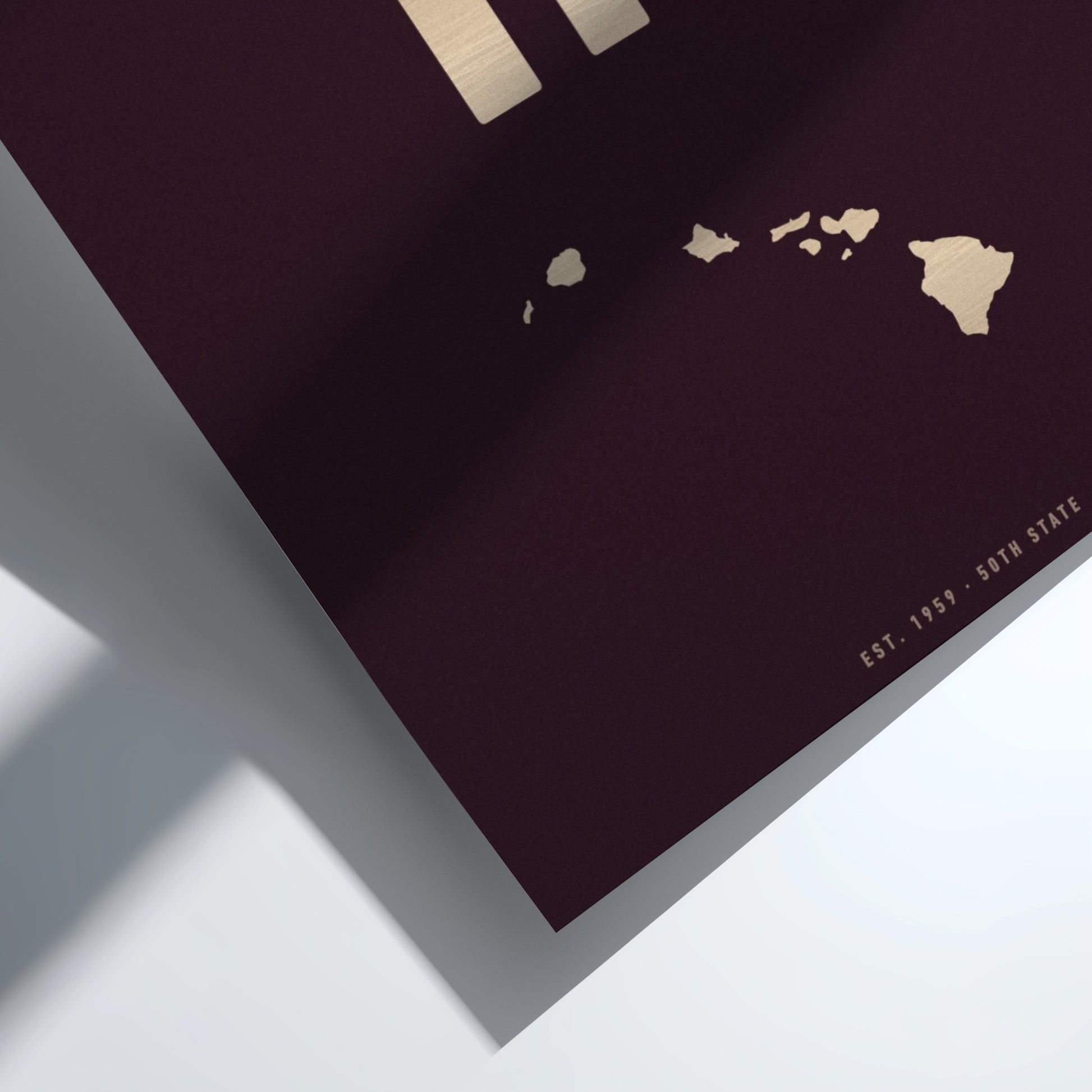 Map of Hawaii on a dark surface with a light background