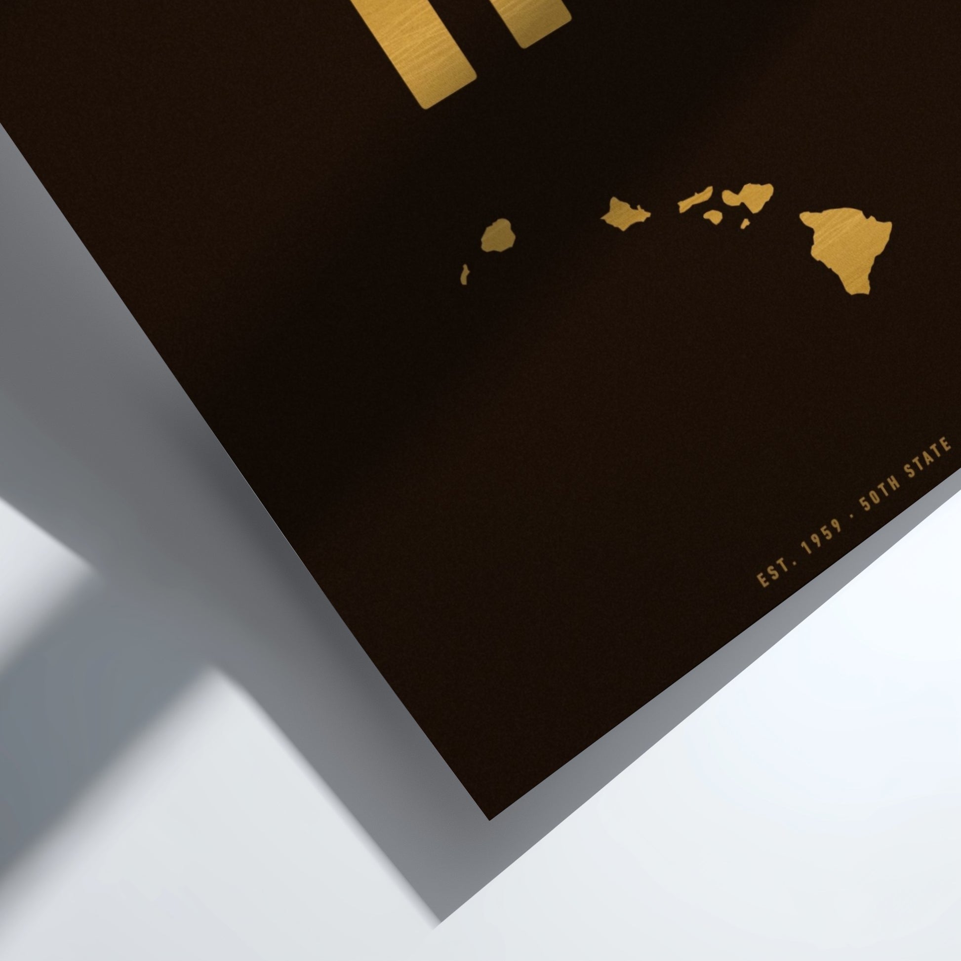 Map of Hawaii with gold outline on a black background