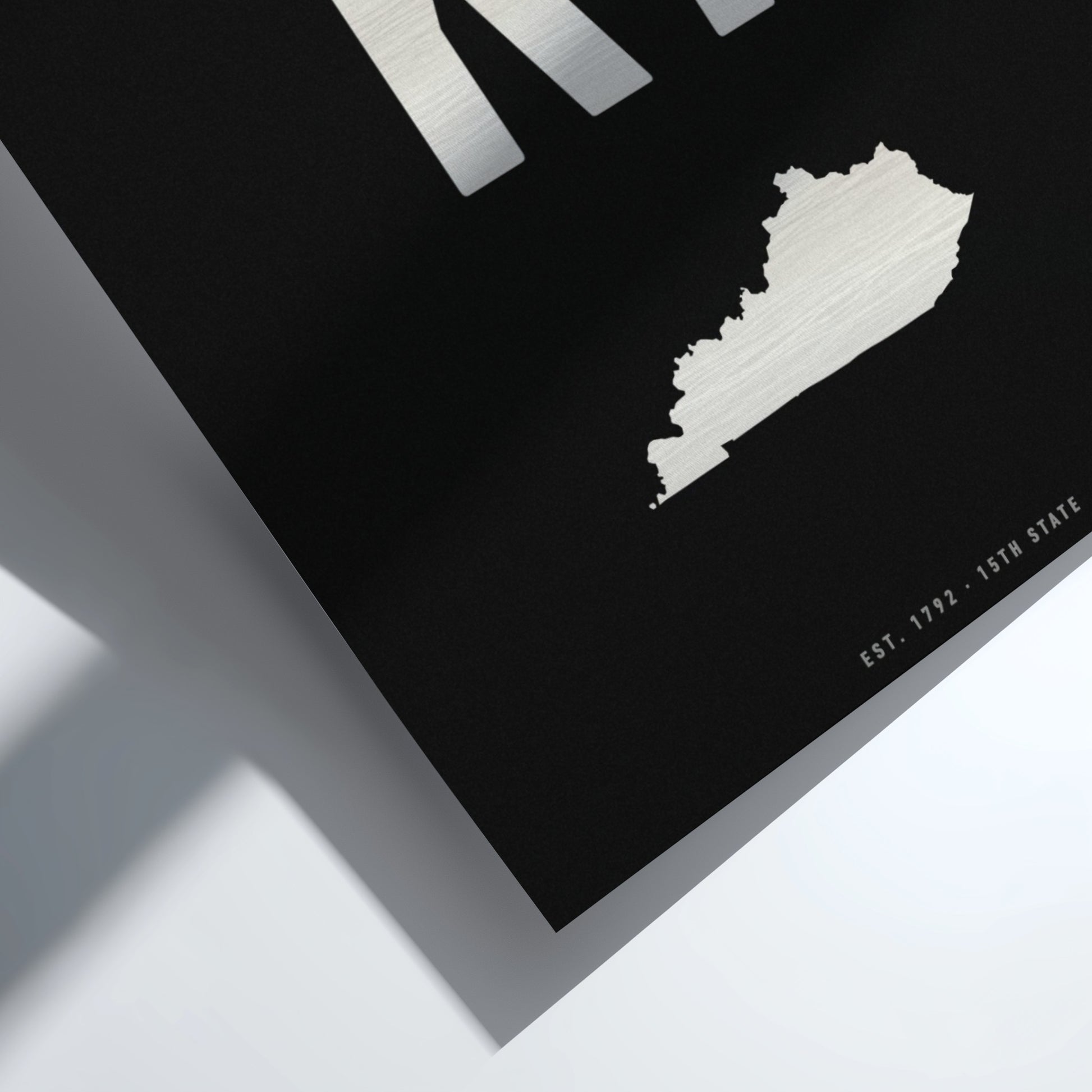 Map of Kentucky on a black background with white text