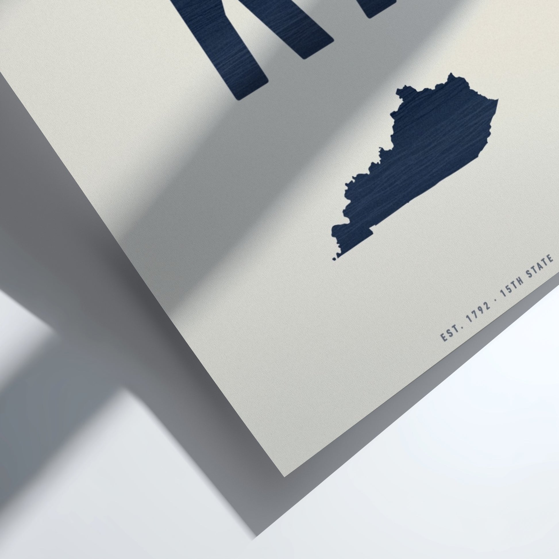 Map of Kentucky in navy on a light gray background