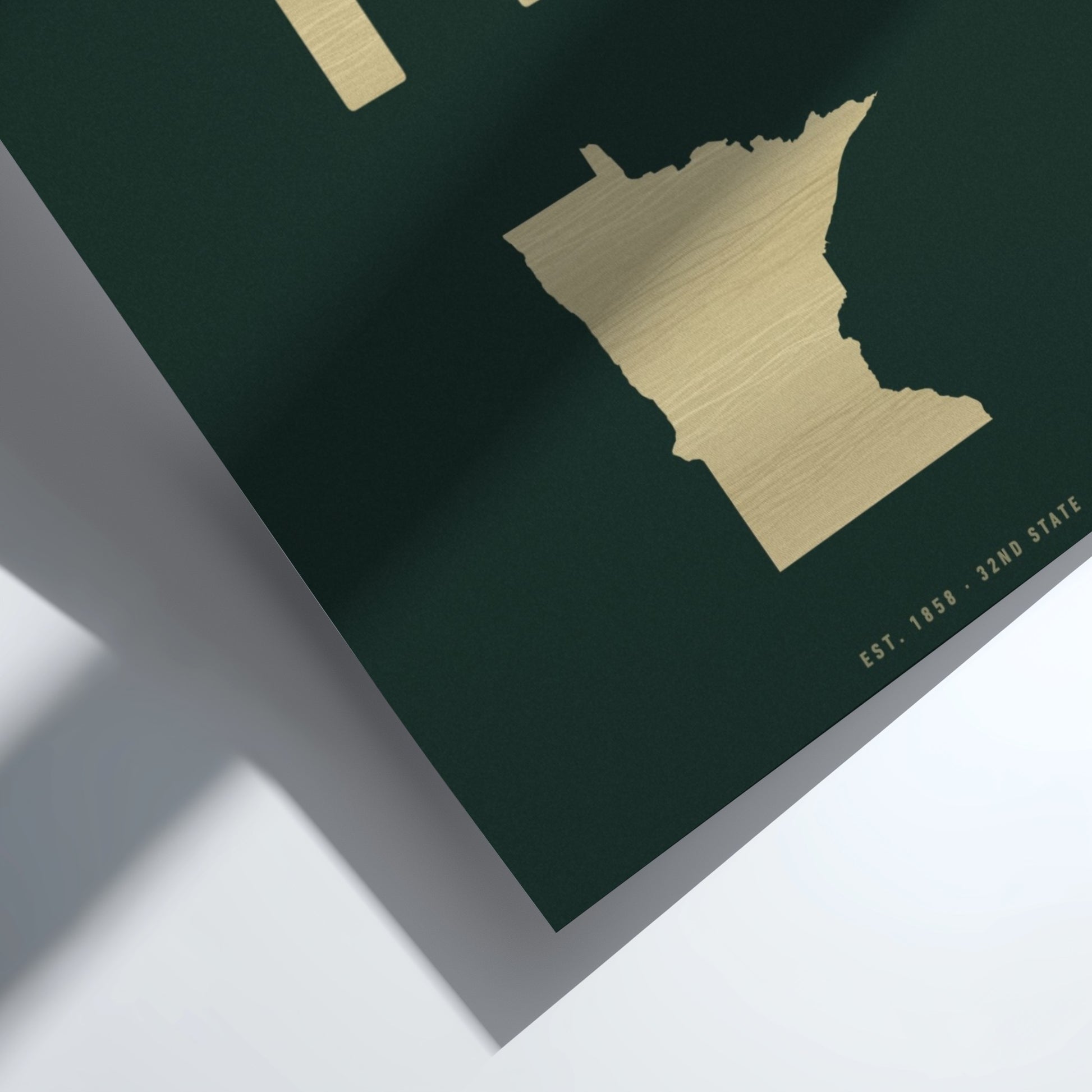 Gold map outline on a green background