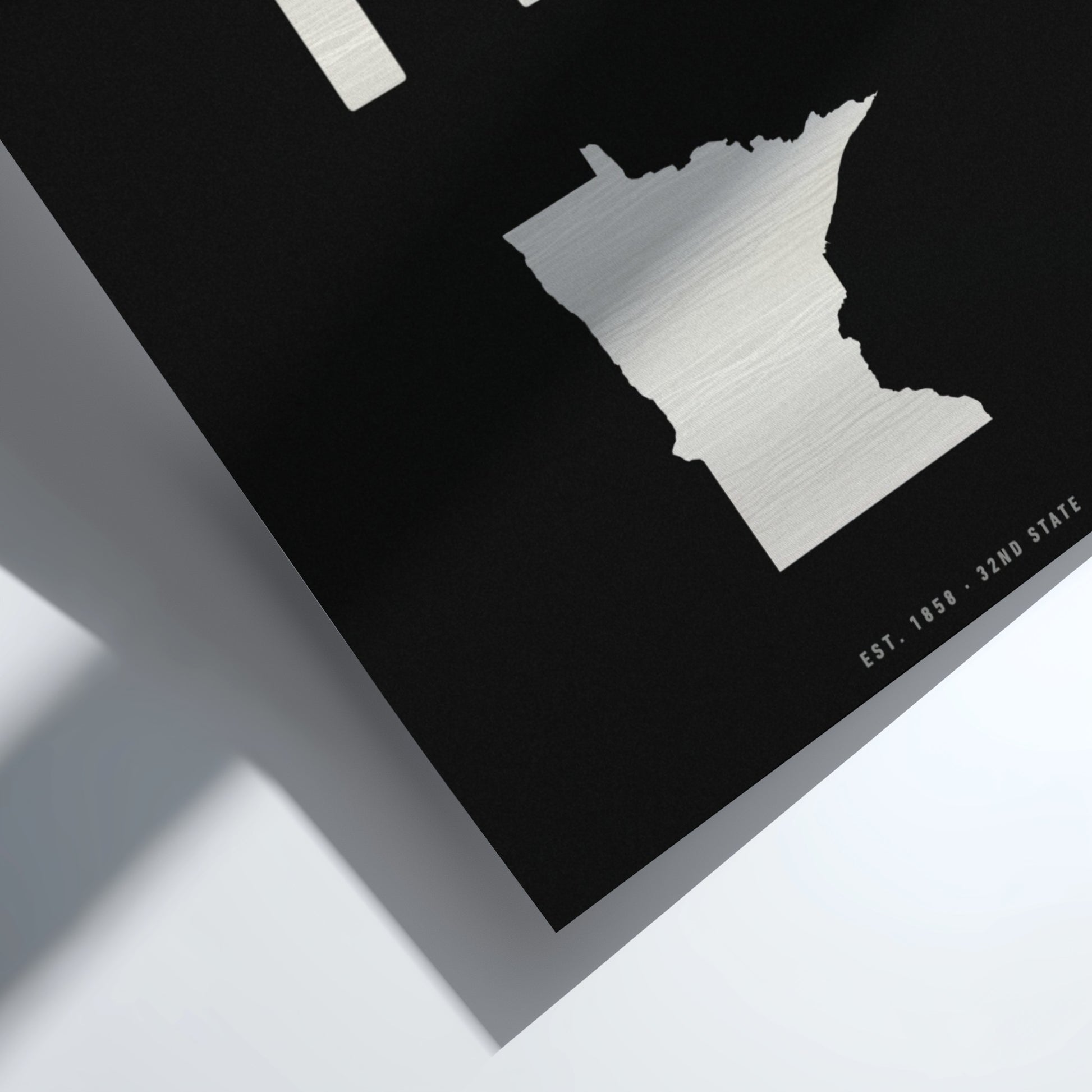 Metallic state outline on a black background