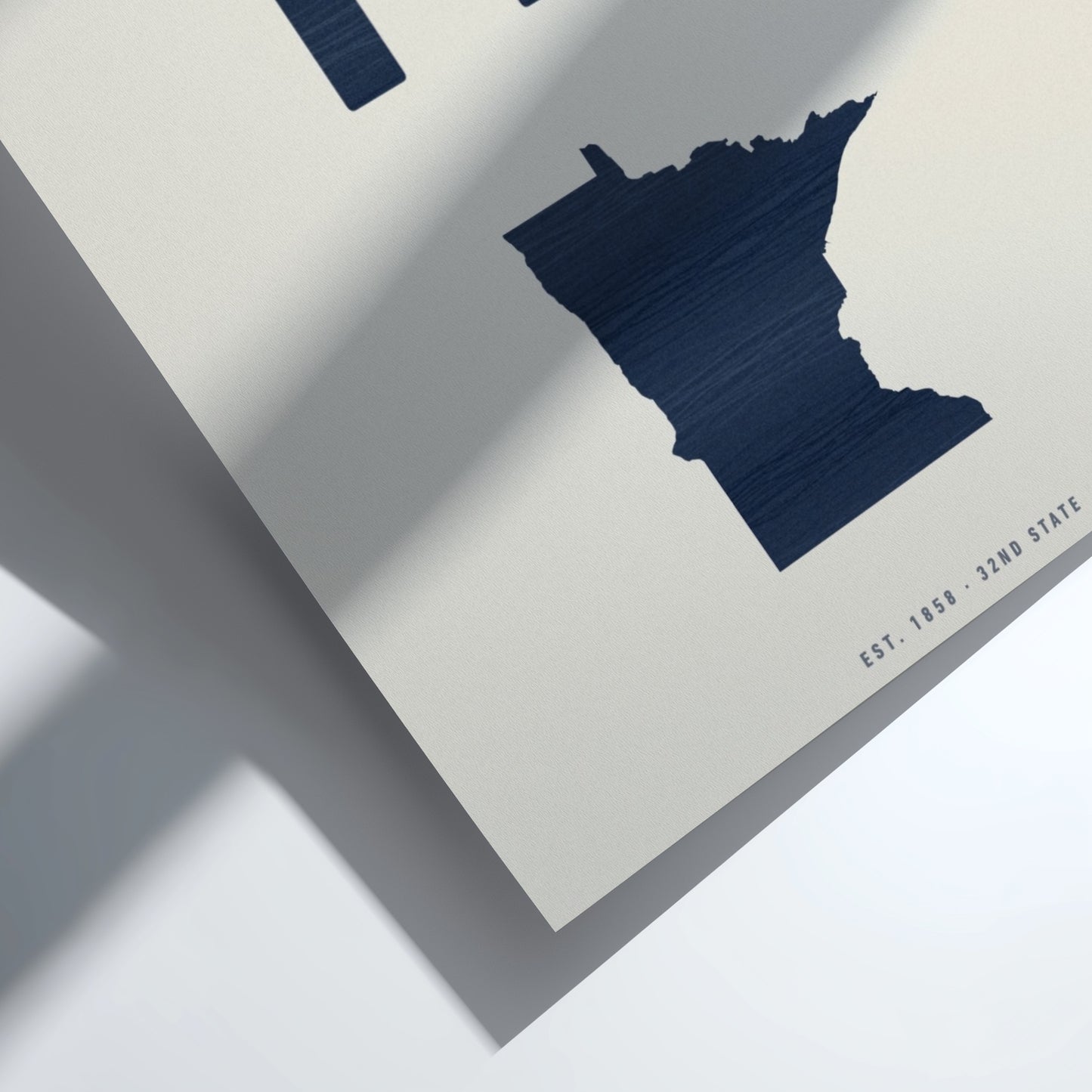 Navy blue outline of a state on a light gray background