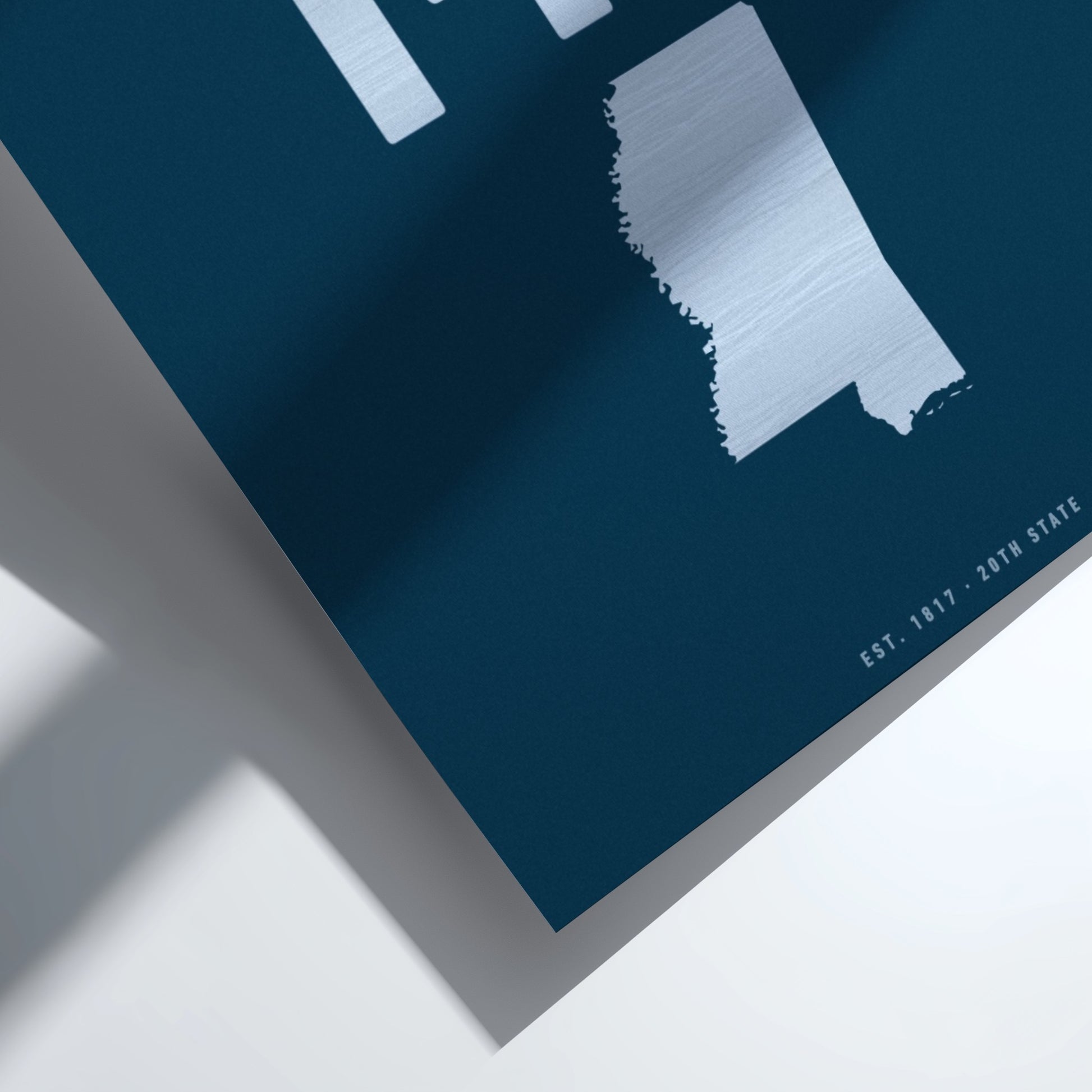 Map of Alabama on a blue background with white text